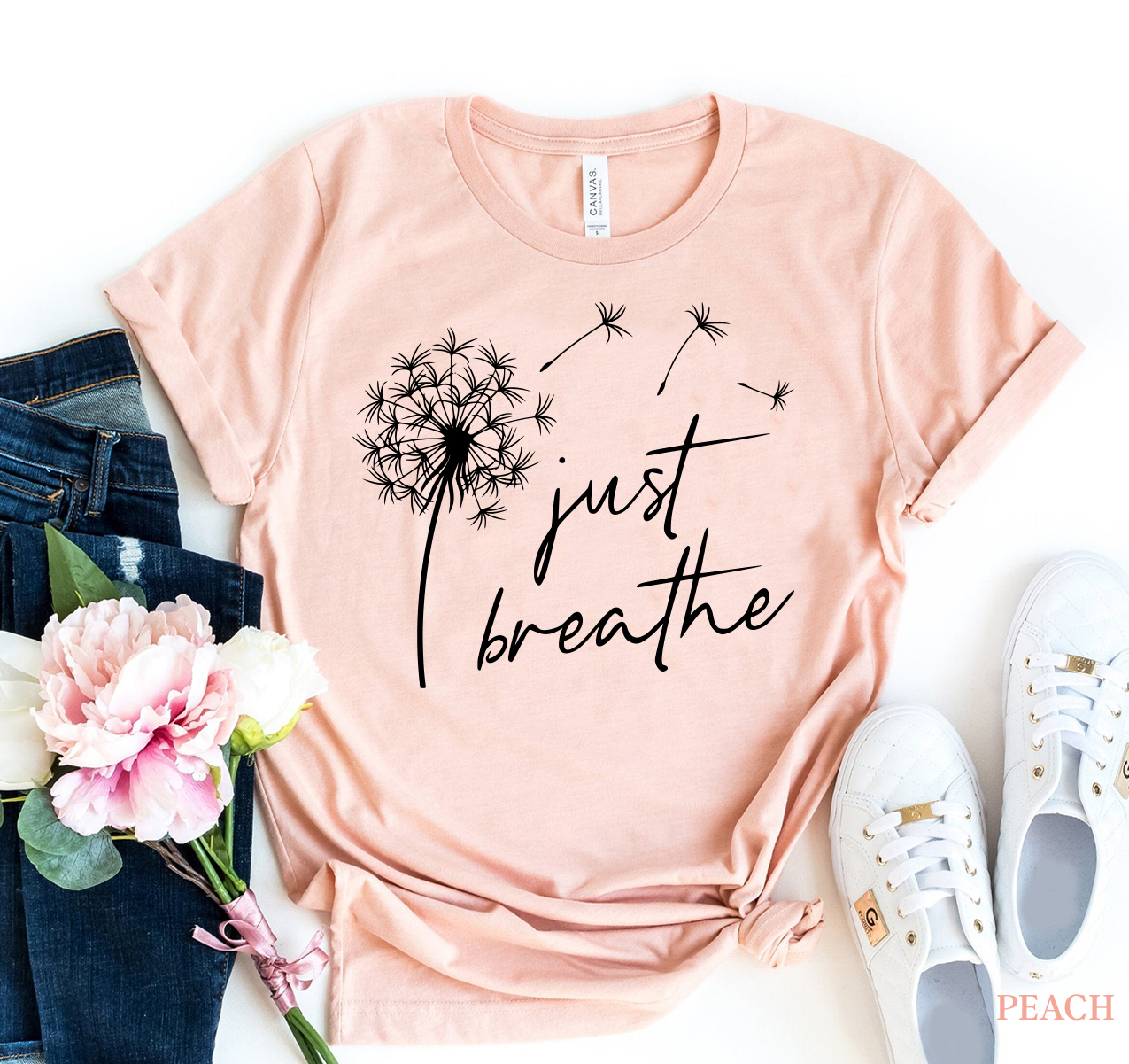 Just Breathe T-shirt made from premium ring spun cotton, featuring a soft textile flex print design in various sizes.