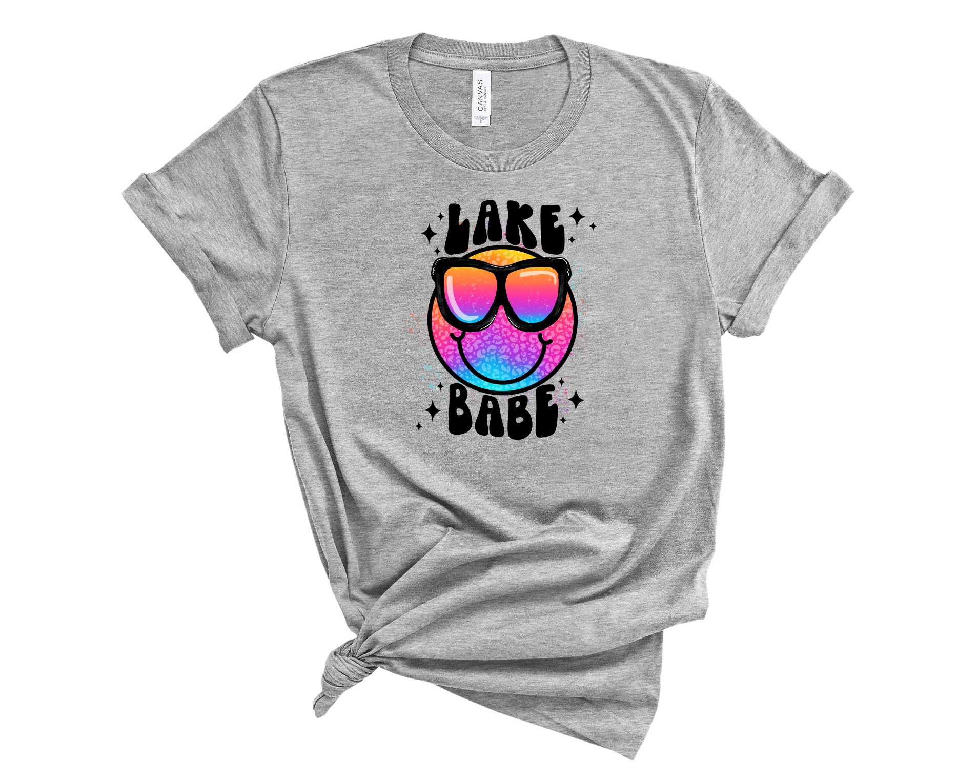 Lake Babe Smiley Graphic Tee featuring a vibrant smiley face design on a soft fabric, suitable for unisex wear.