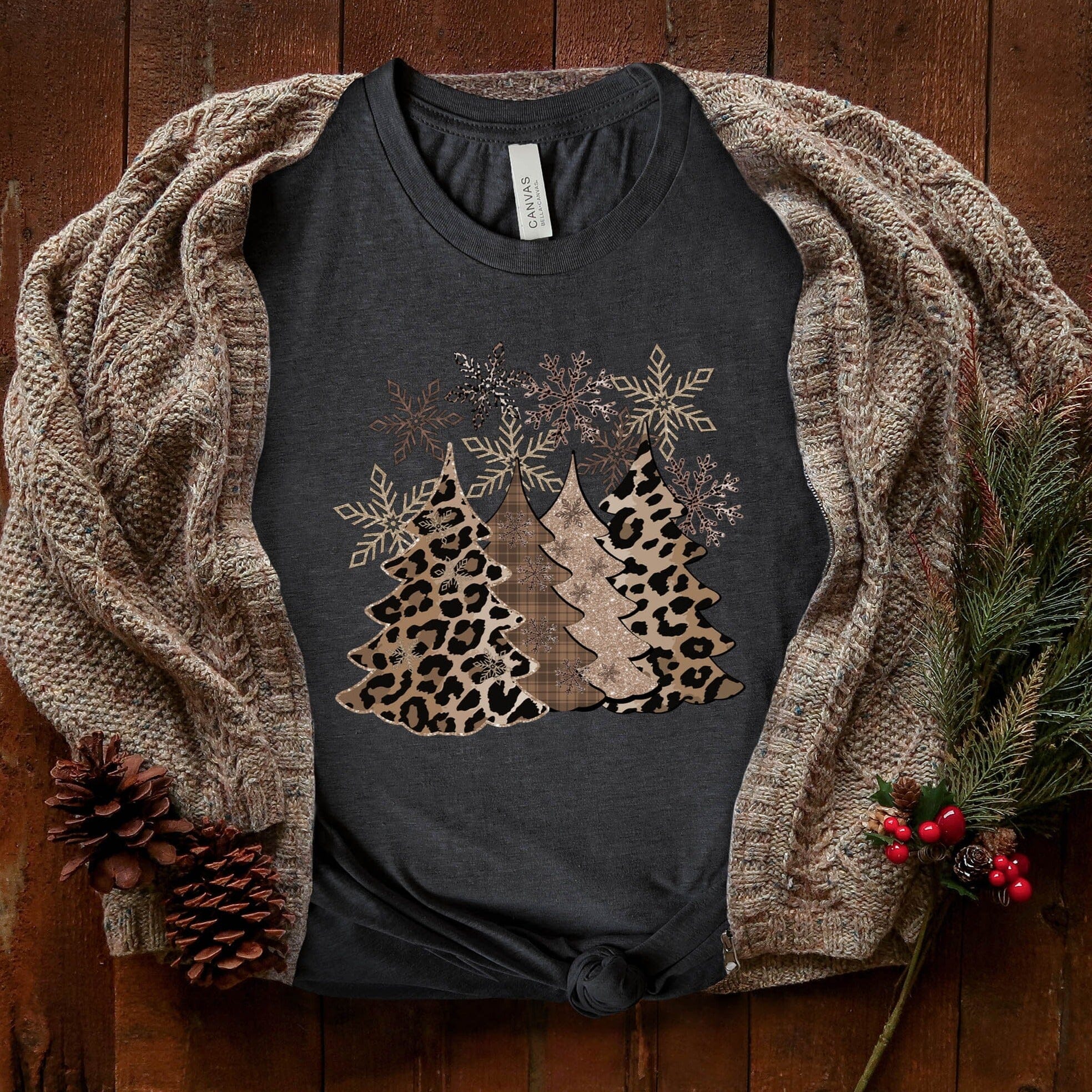 Leopard Christmas Tee featuring a stylish leopard print design, perfect for festive occasions, made from soft ringspun cotton.