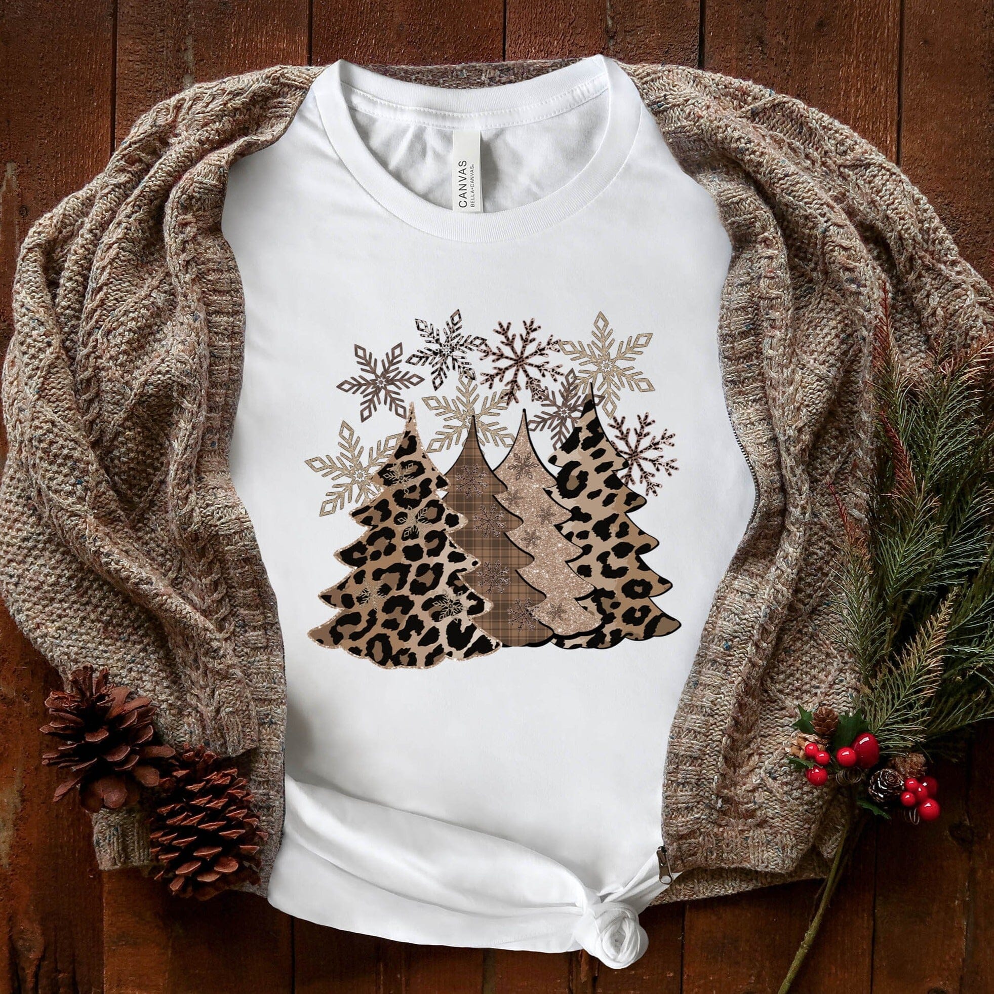 Leopard Christmas Tee featuring a stylish leopard print design, perfect for festive occasions, made from soft ringspun cotton.