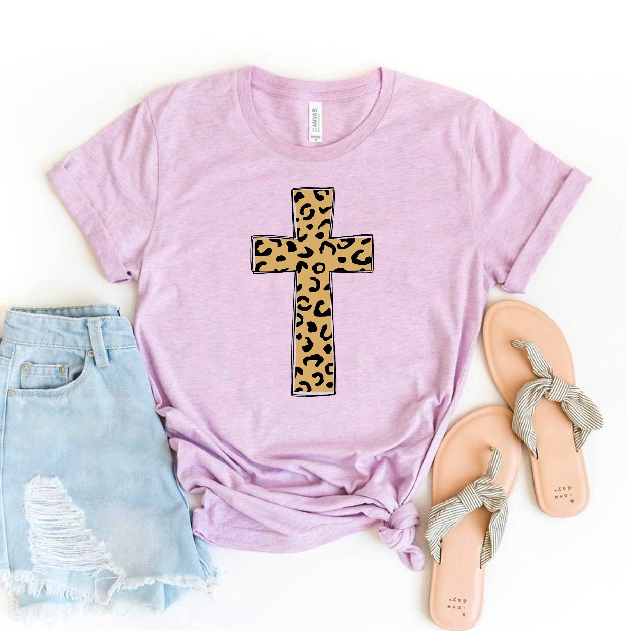 Leopard Cross T-shirt featuring a stylish design on premium ring spun cotton fabric, available in various sizes.
