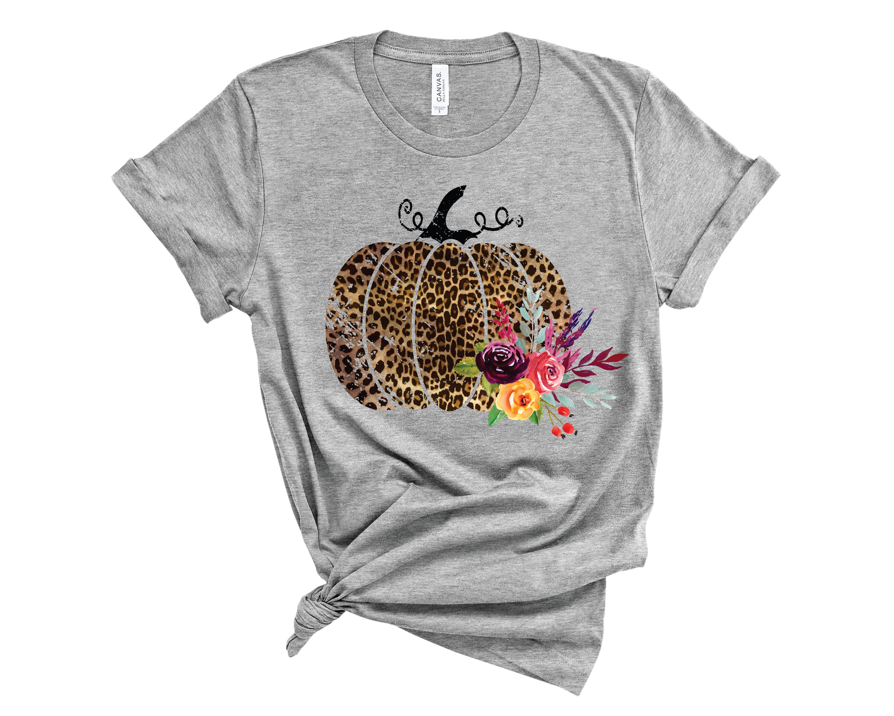 Leopard Pumpkin Floral Graphic Tee featuring a stylish design with leopard print and pumpkin motifs on a soft fabric.