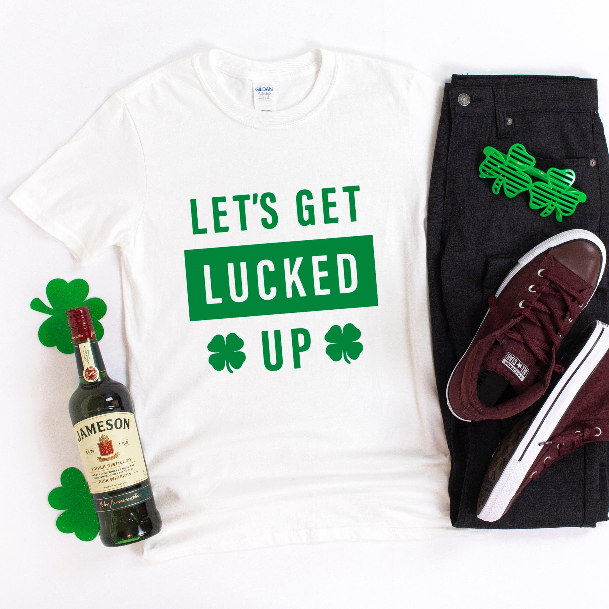 A vibrant green T-shirt with the text 'Lets Get Lucked Up' printed in a fun font, perfect for St. Patrick's Day celebrations.