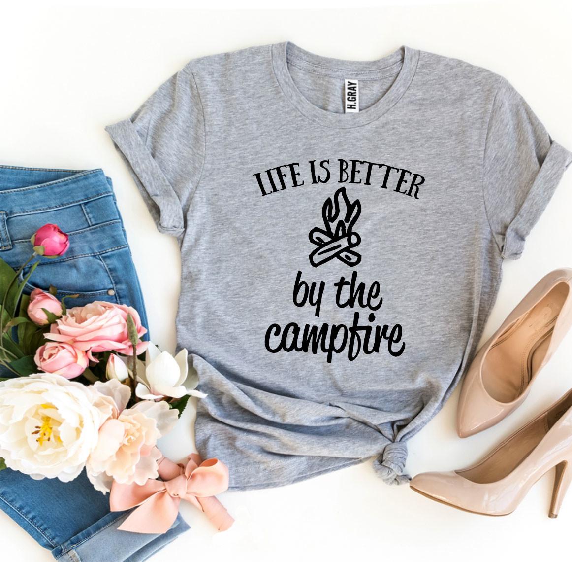 A soft and comfortable 'Life Is Better By The Campfire' T-shirt made from premium ring spun cotton, featuring a striking campfire-themed design.