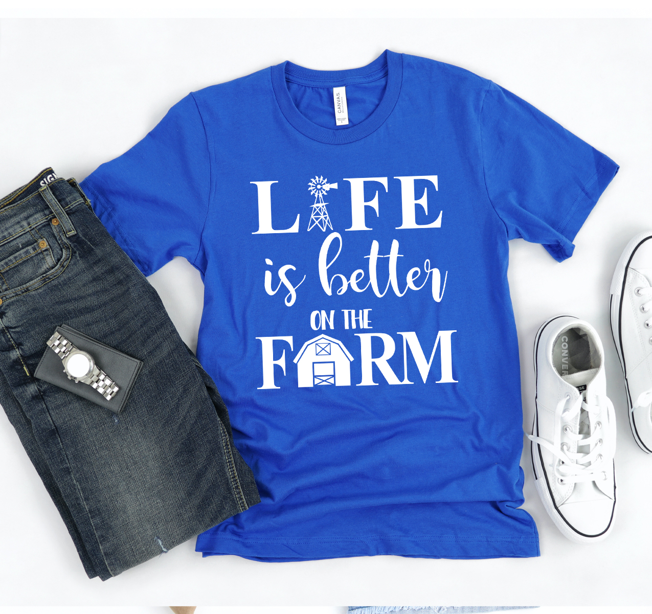 A unisex Bella Canvas T-shirt featuring the phrase 'Life Is Better On The Farm' in a stylish font, showcasing its soft cotton fabric.