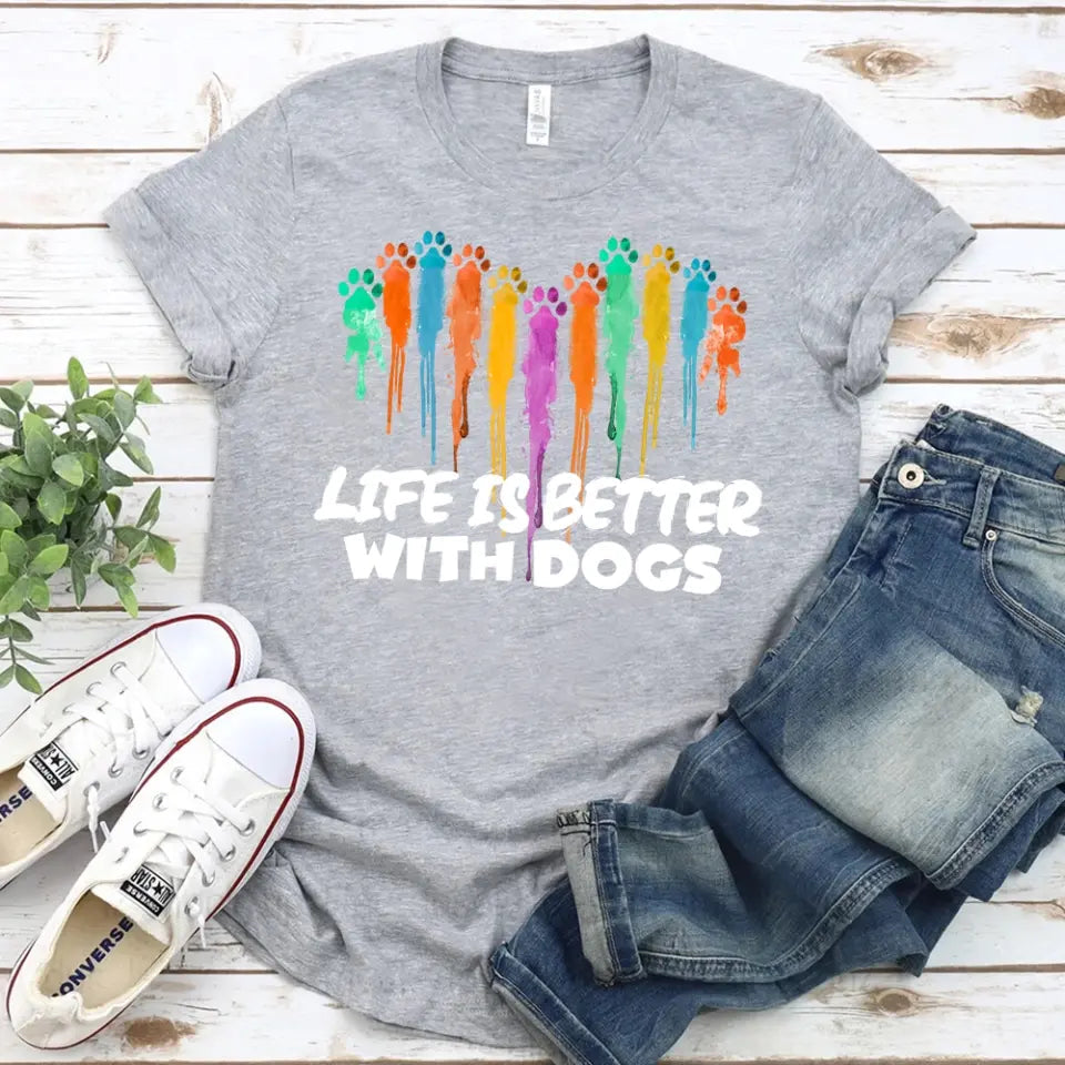 Unisex tee featuring the phrase 'Life is Better With Dogs', designed for dog lovers, made from soft ringspun cotton.