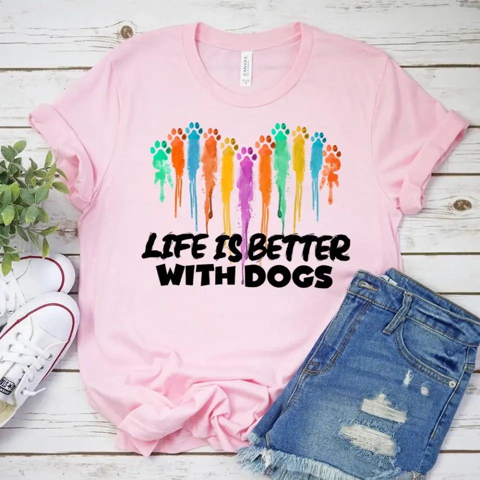 Unisex tee featuring the phrase 'Life is Better With Dogs', designed for dog lovers, made from soft ringspun cotton.