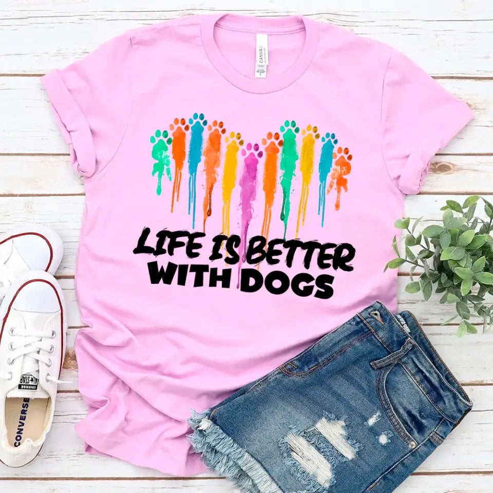 Unisex tee featuring the phrase 'Life is Better With Dogs', designed for dog lovers, made from soft ringspun cotton.