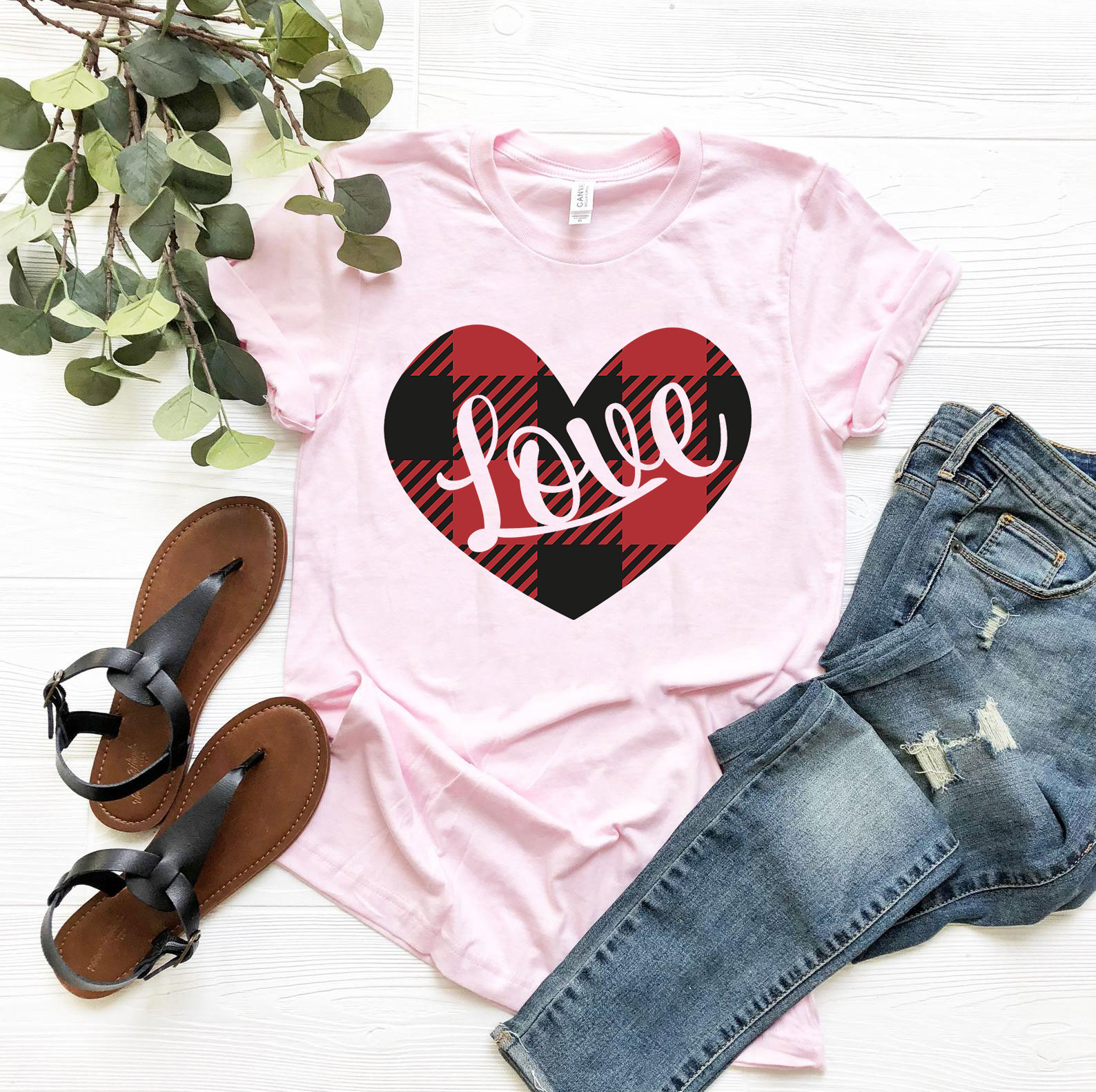 A unisex Love Heart Shirt made from soft ring spun cotton, featuring a vibrant heart design, available in multiple colors.