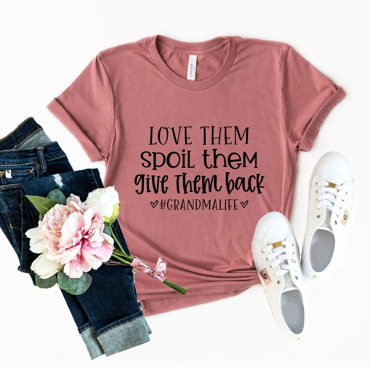 Unisex Love Them Spoil Them Give Them Back Shirt in various colors, showcasing its soft fabric and stylish design.