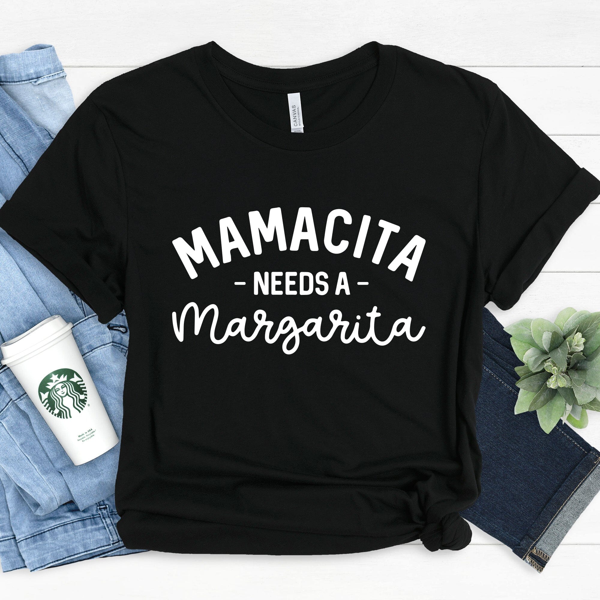 Mamacita Needs a Margarita Tee displayed on a hanger, showcasing its vibrant color and comfortable fabric.
