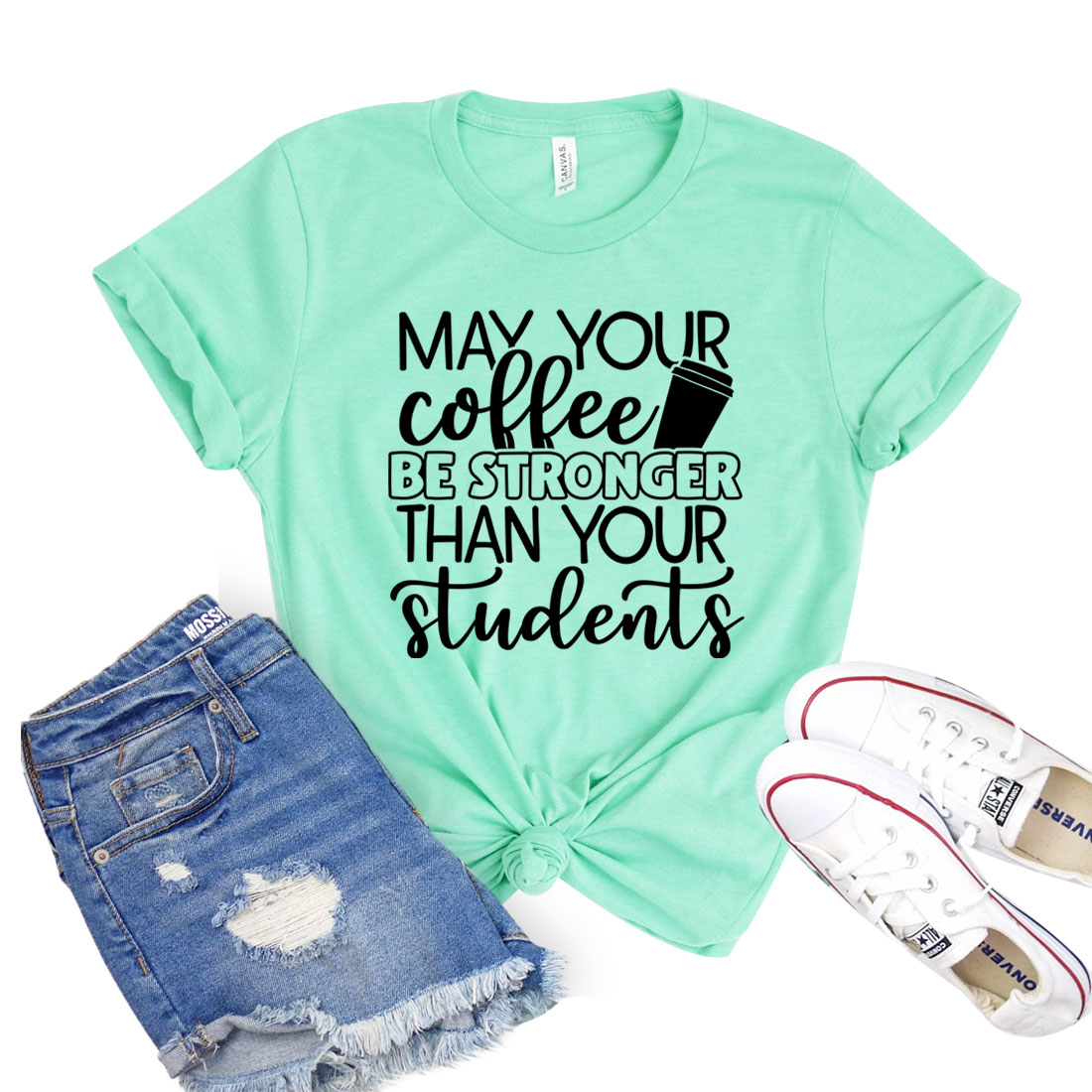 A unisex Bella Canvas t-shirt featuring the phrase 'May Your Coffee Be Stronger Than Your Students' in a stylish font.