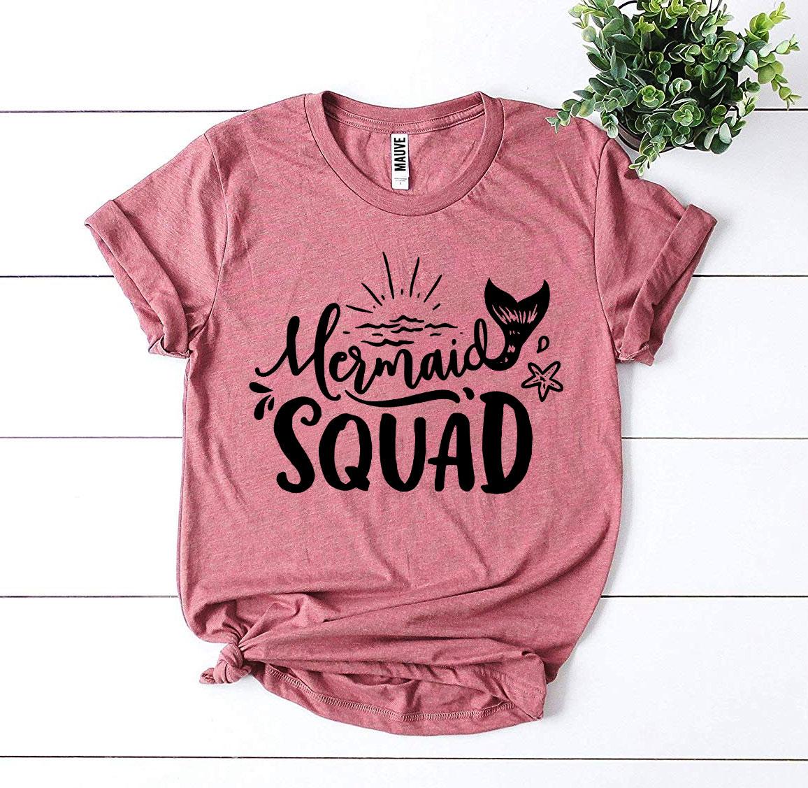 Mermaid Squad T-shirt made of premium ring spun cotton with a vibrant design, available in various sizes.