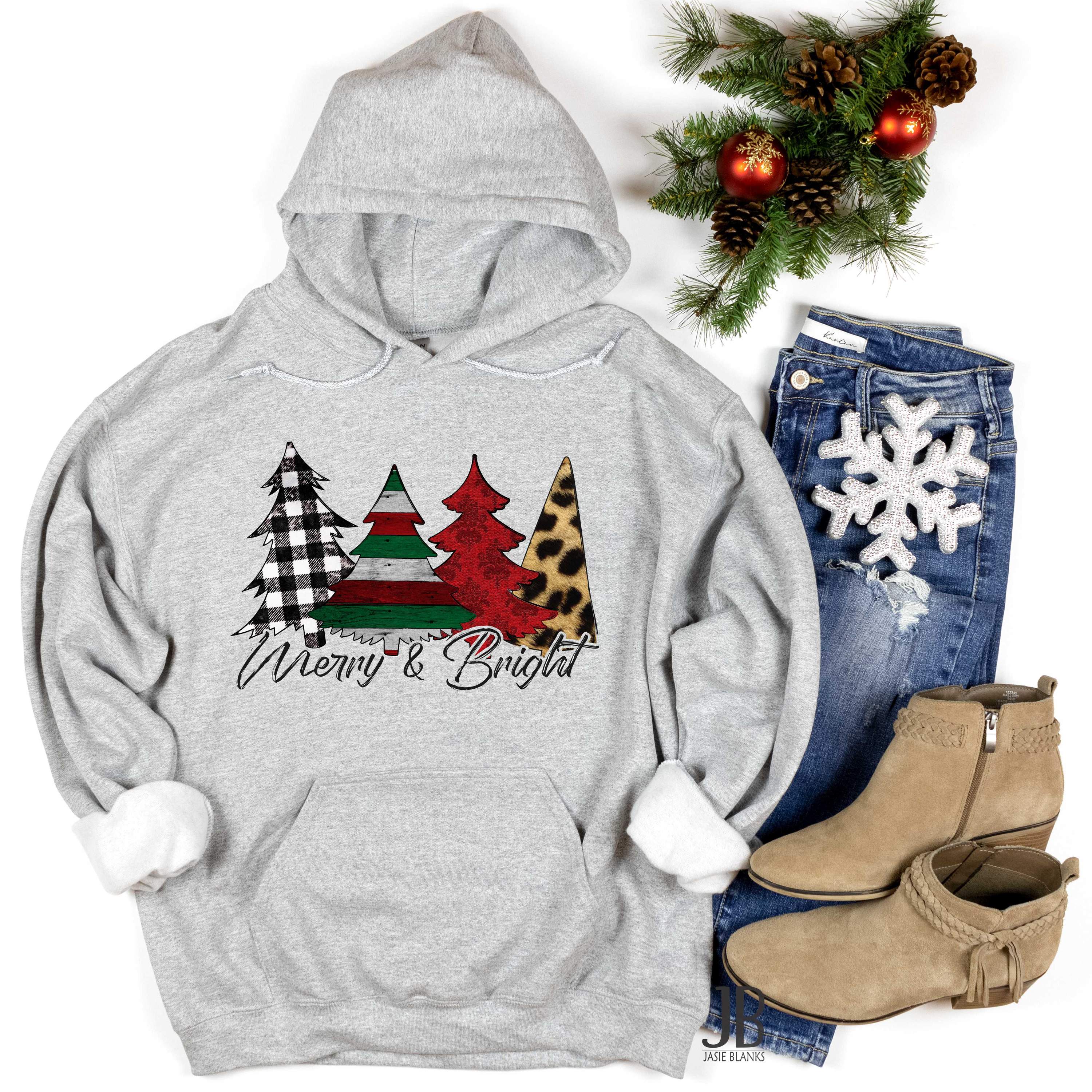 A cozy unisex hoodie featuring a festive graphic of bright trees, perfect for holiday wear.