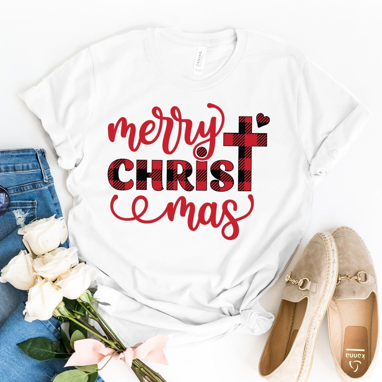 A festive Merry Christmas Tee featuring a cheerful design, made from soft ringspun cotton, perfect for holiday celebrations.