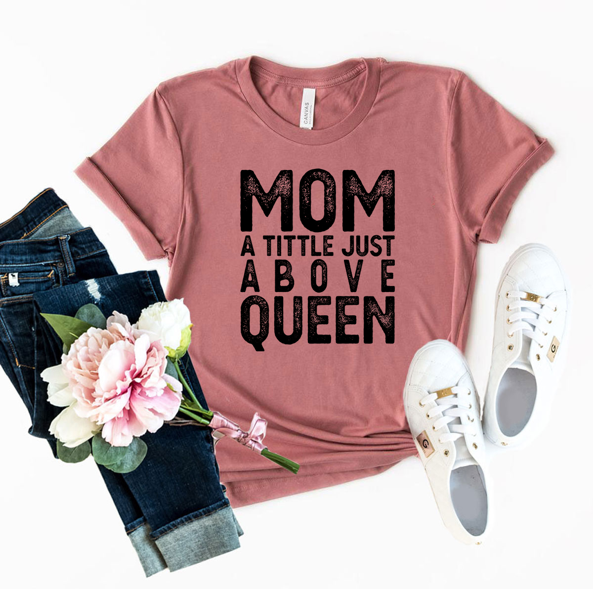 Unisex T-shirt featuring the phrase 'Mom A Title Just Above Queen' in stylish print, made from soft ring spun cotton, available in multiple colors.
