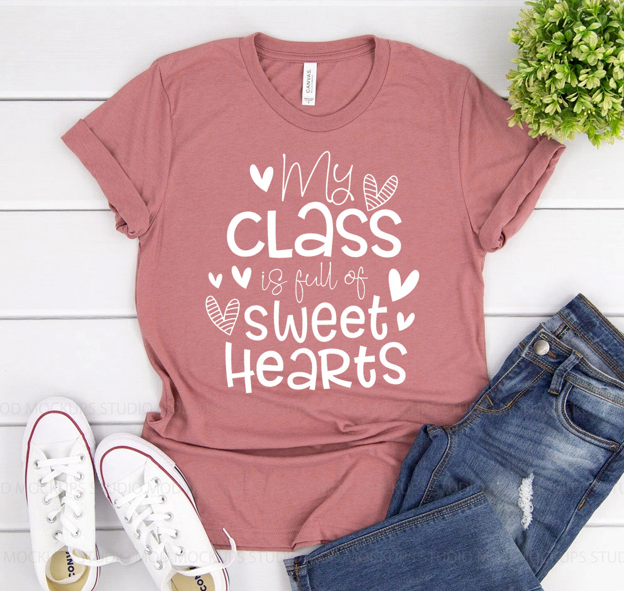 A unisex Bella Canvas 3001 t-shirt featuring the phrase 'My Class is Full of Sweet Hearts' in a playful font, showcasing its soft fabric and classic fit.