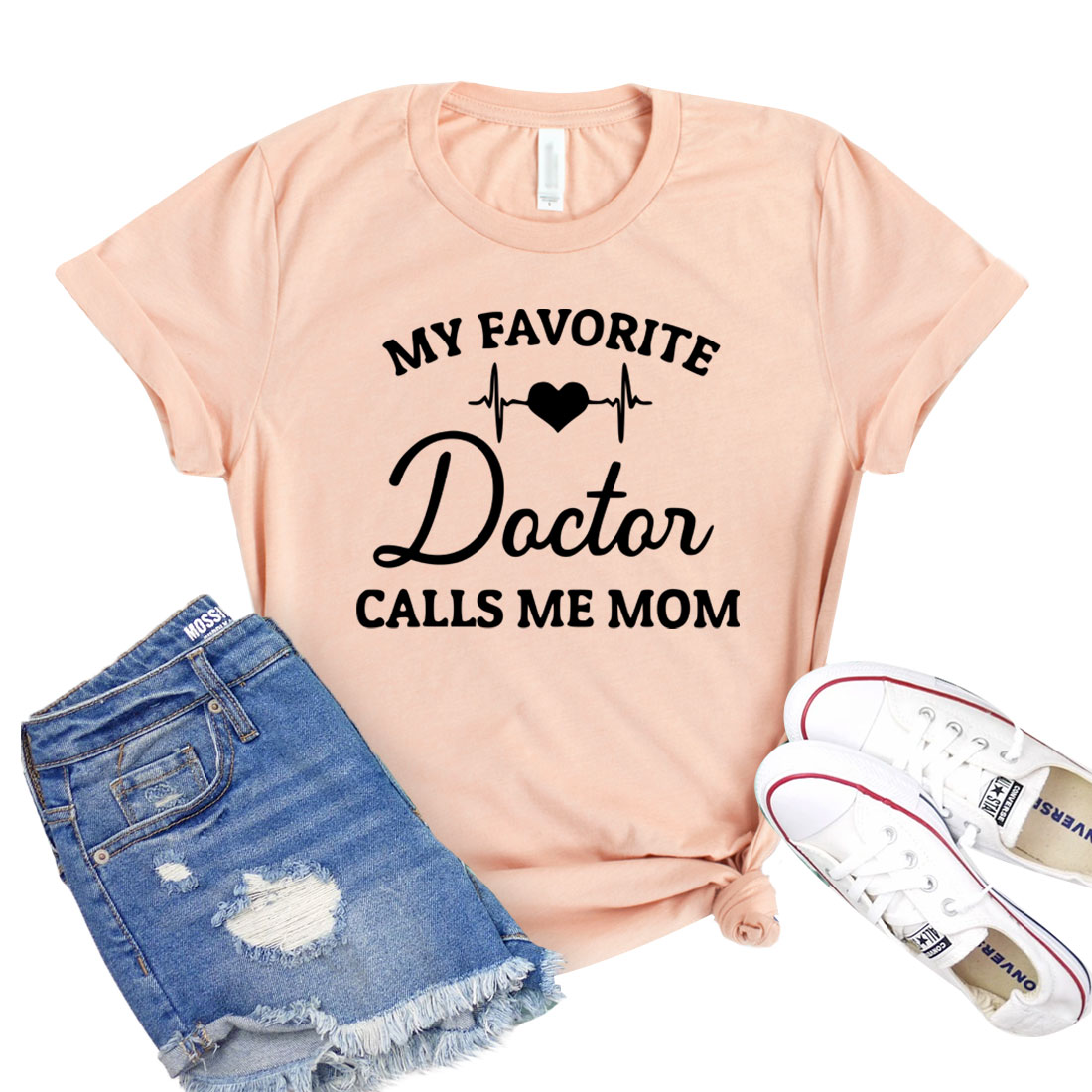 A stylish unisex t-shirt featuring the phrase 'My Favorite Doctor Calls Me Mom' in a playful font, made from soft cotton fabric.