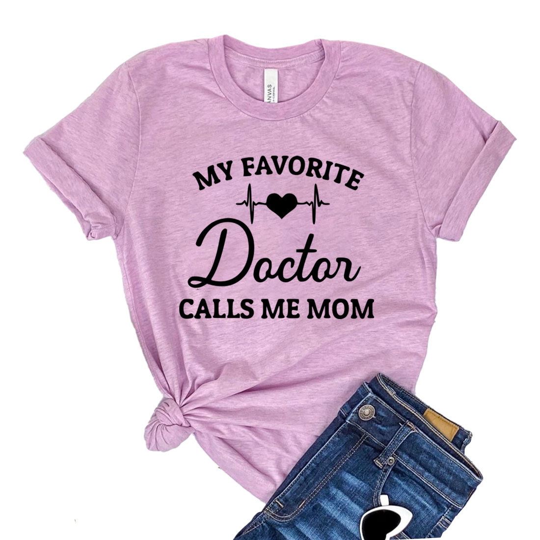 A stylish unisex t-shirt featuring the phrase 'My Favorite Doctor Calls Me Mom' in a playful font, made from soft cotton fabric.