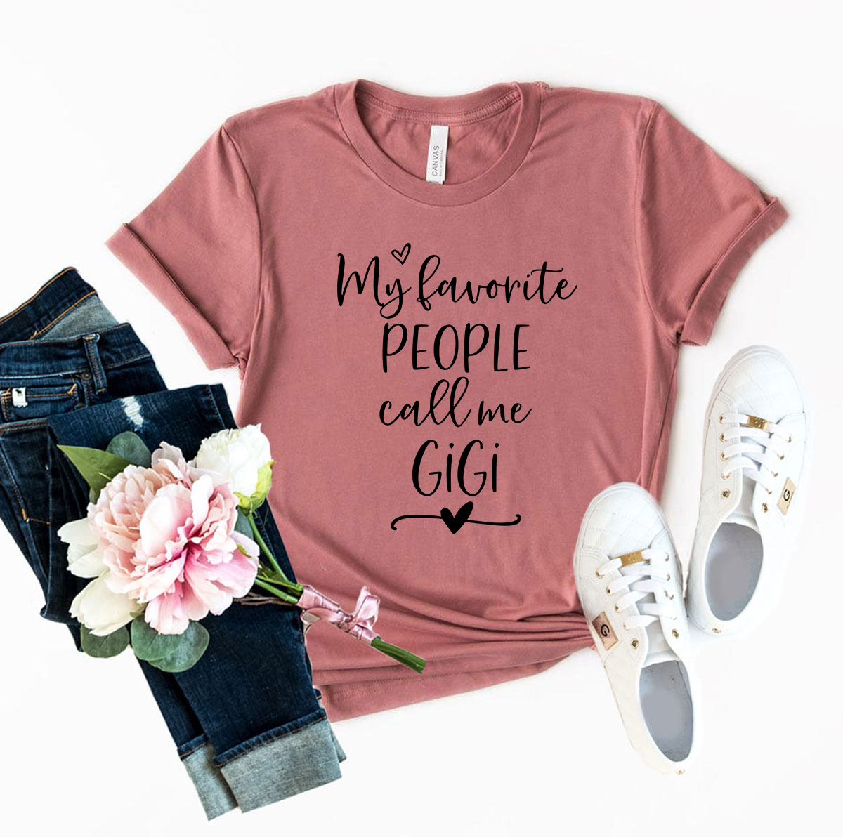 A stylish unisex T-shirt featuring the phrase 'My Favorite People Call Me Gigi' in vibrant colors, made from soft ring spun cotton.