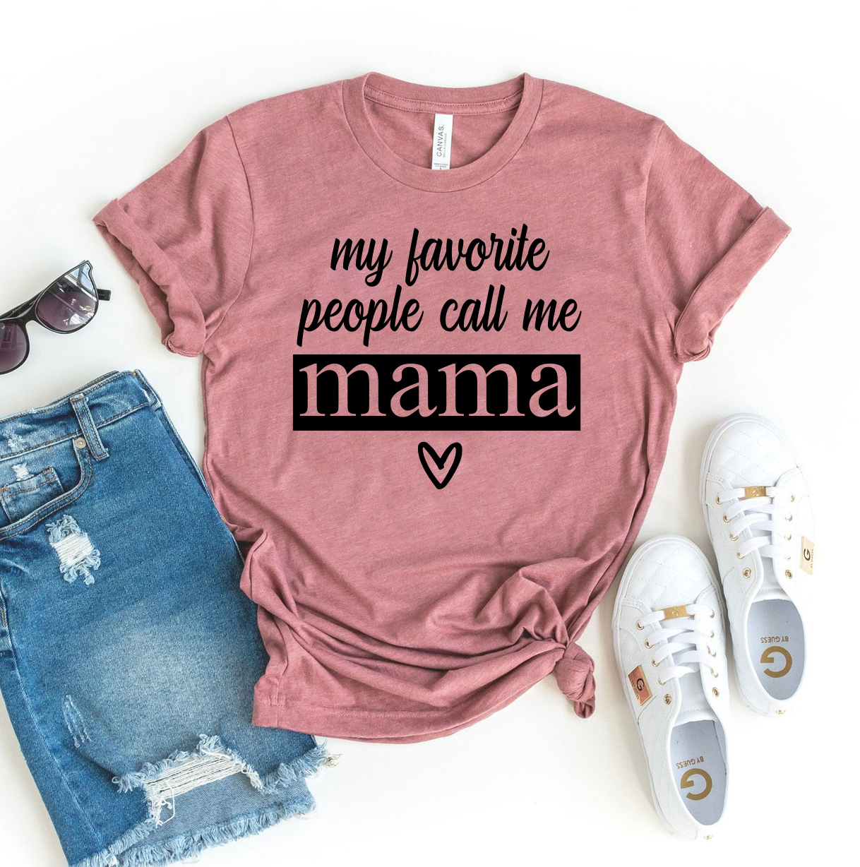 A soft, premium quality t-shirt with the phrase 'My Favorite People Call Me Mama' printed in stylish font, showcasing its comfortable fit.