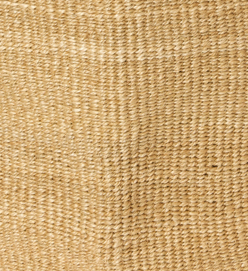 Handwoven natural sisal and fibre African floor storage baskets in cream color, showcasing their unique texture and design.
