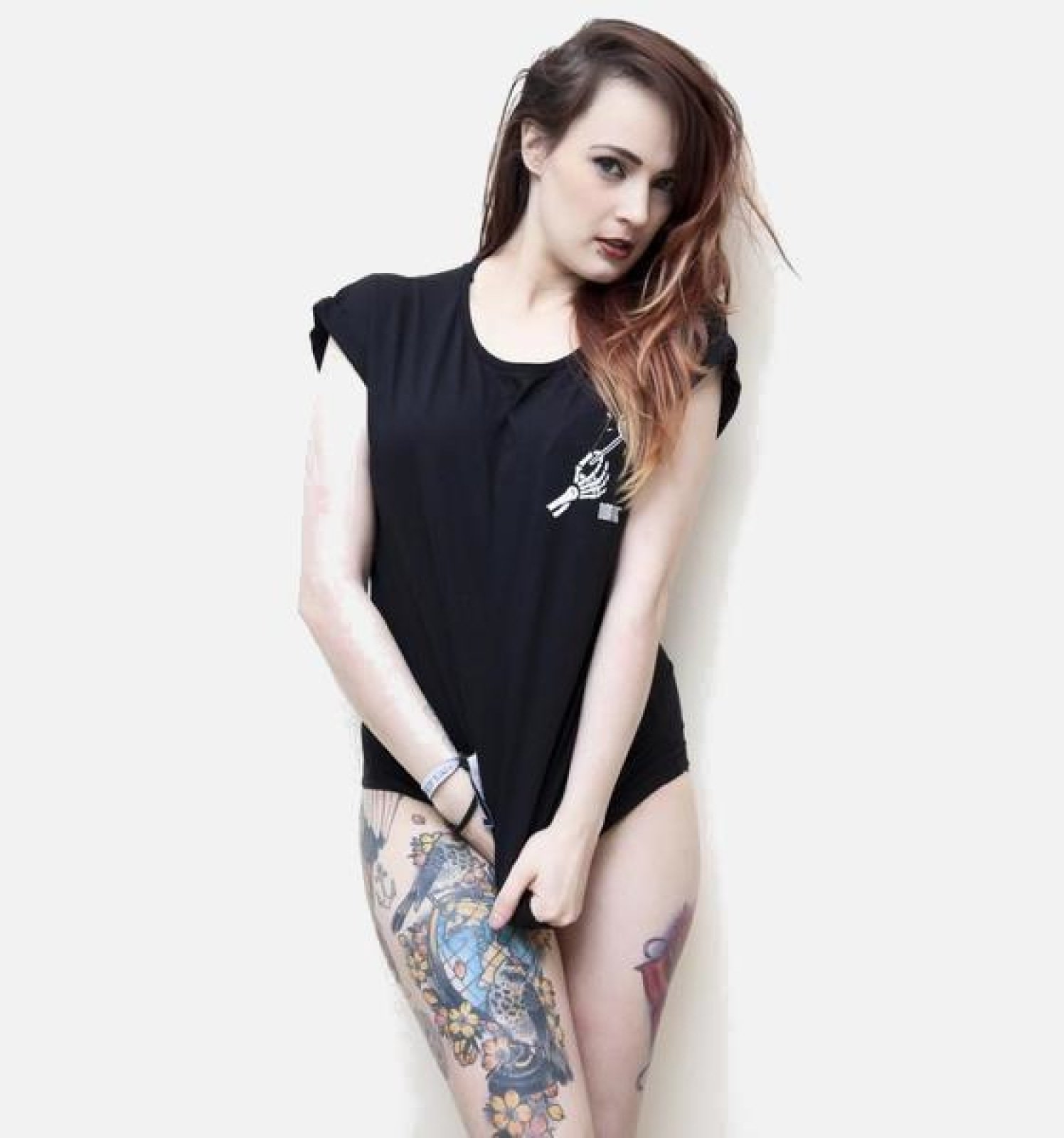 Norvine Candy Women's Rolled Sleeve Tunic Tee in black, featuring a crew neck and rolled sleeves, made from 100% combed cotton.