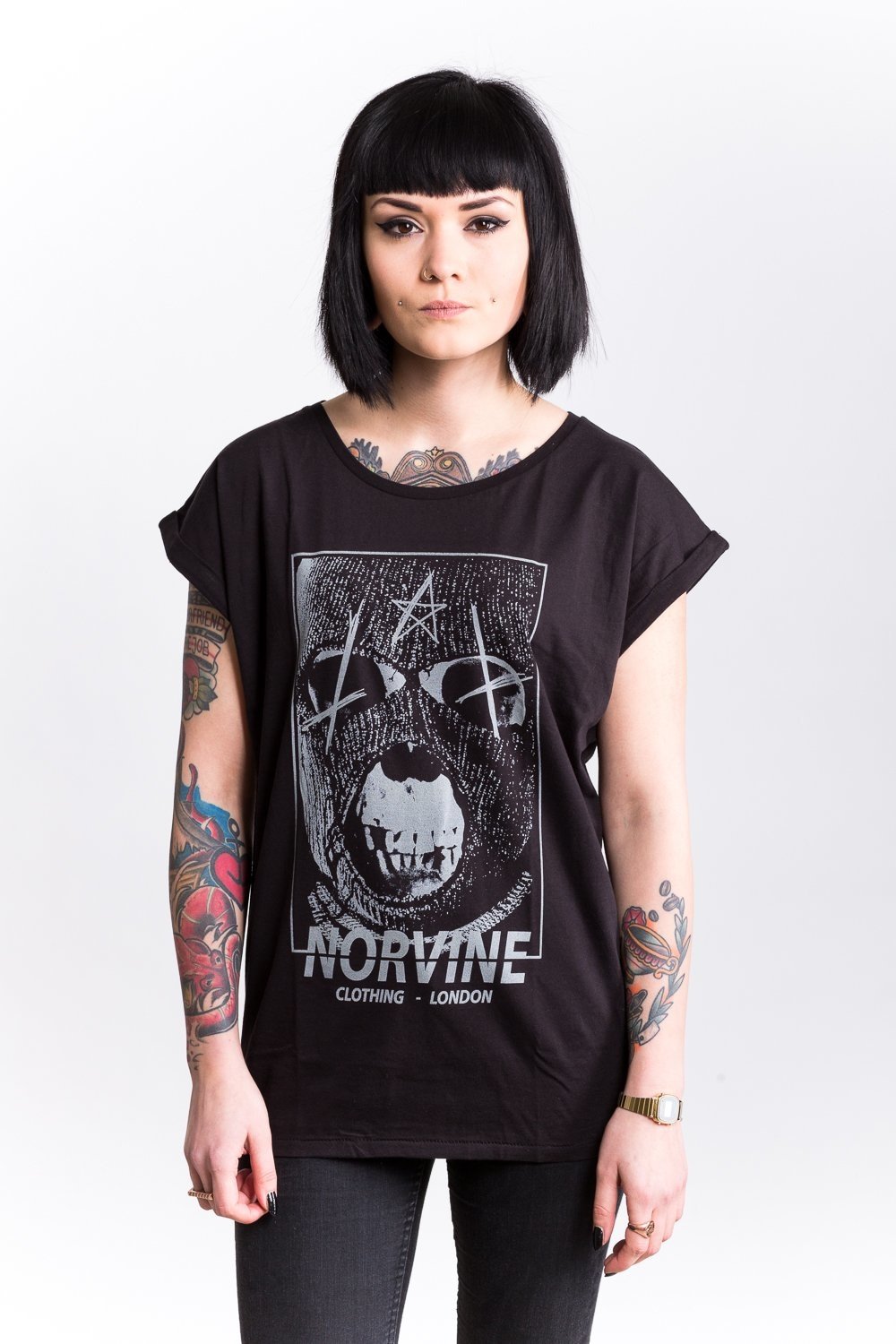 Norvine Masked Rebel Women's Rolled Sleeve Tunic Tee in black, showcasing its crew neck, rolled sleeves, and soft cotton fabric.