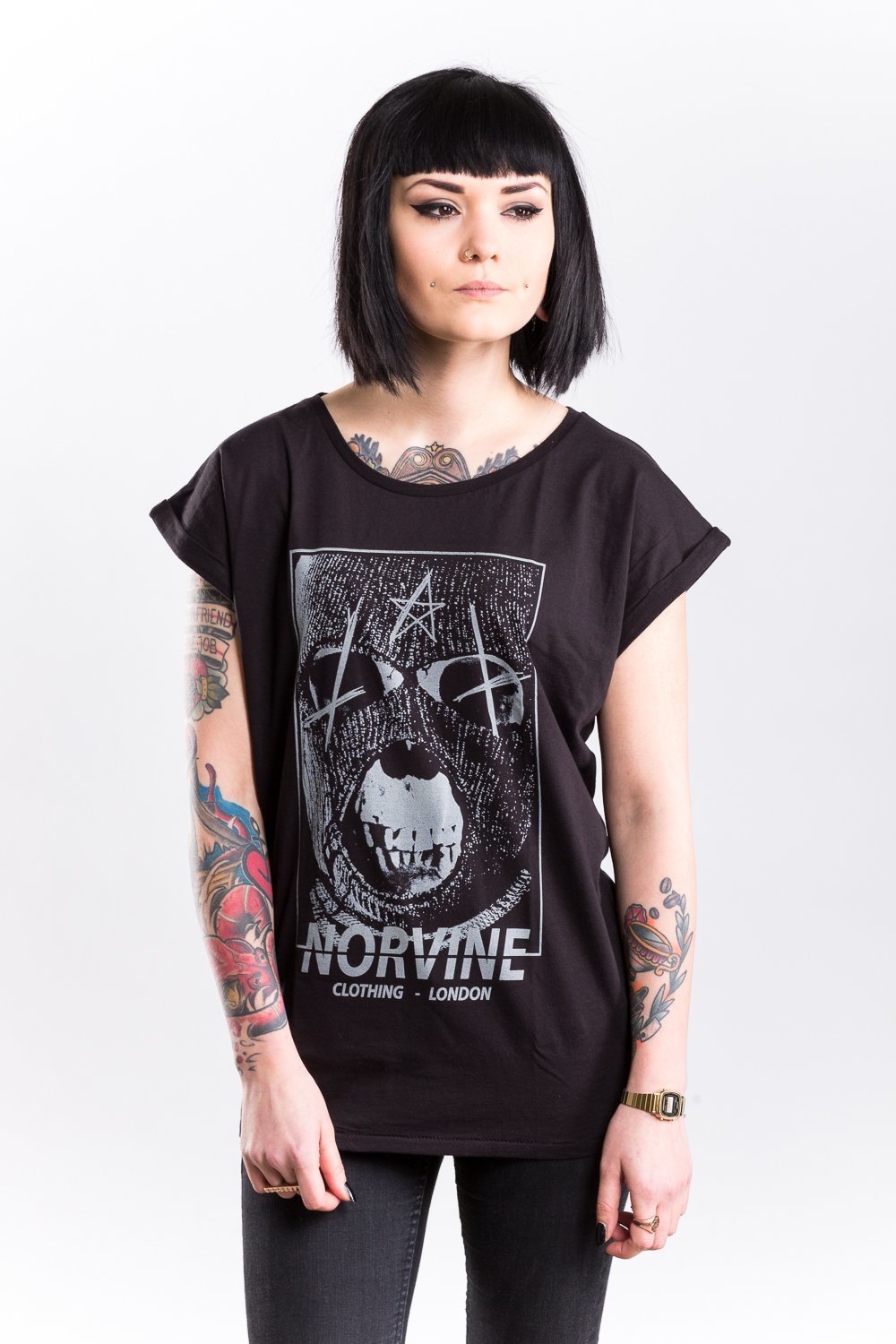 Norvine Masked Rebel Women's Rolled Sleeve Tunic Tee in black, showcasing its crew neck, rolled sleeves, and soft cotton fabric.