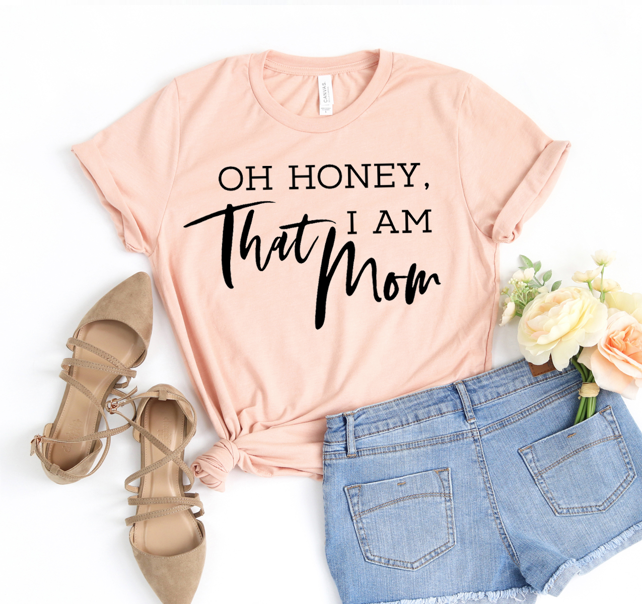 Oh Honey I am That Mom T-shirt displayed on a mannequin, showcasing its soft fabric and stylish design.
