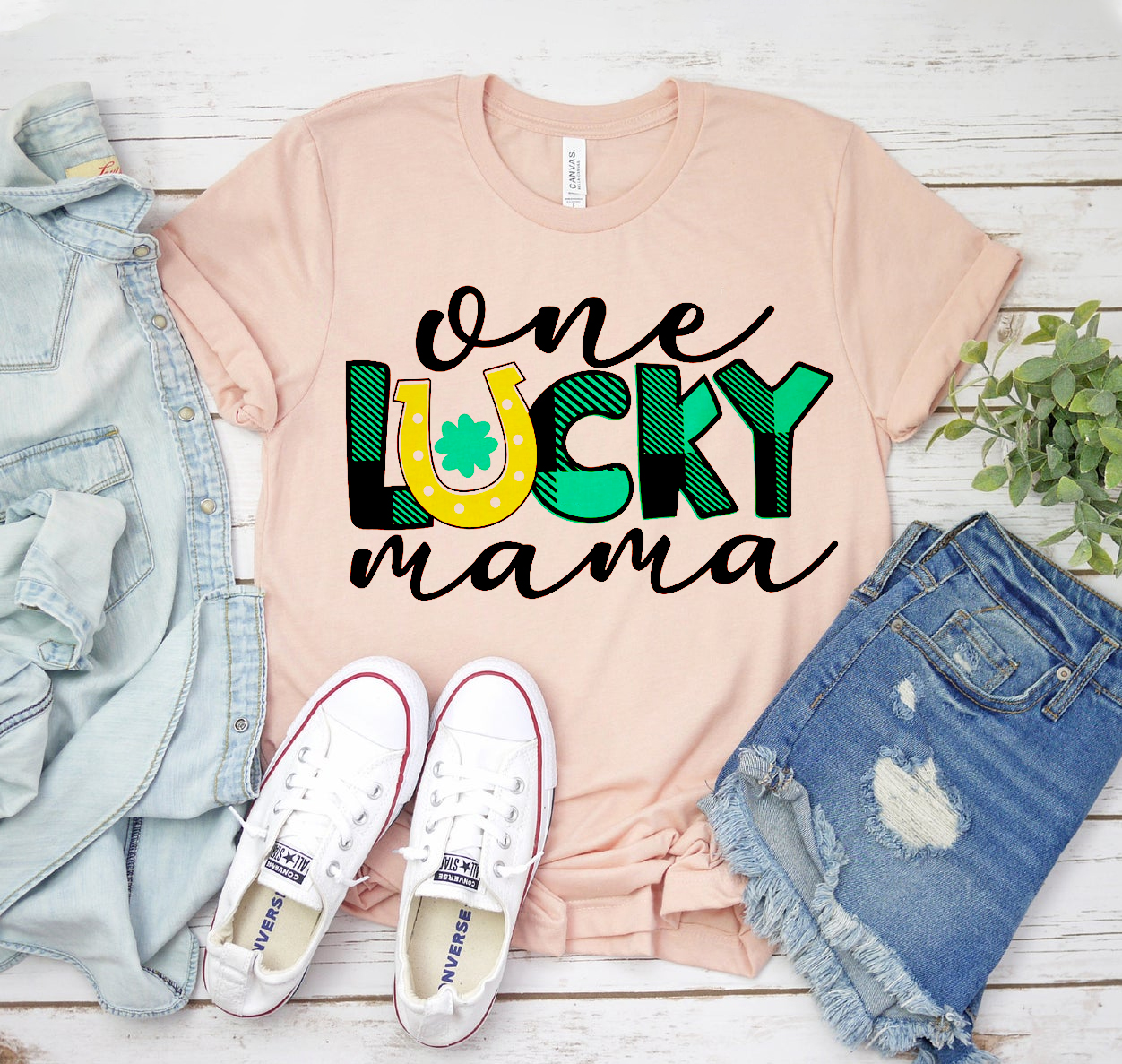 One Lucky Mama T-shirt displayed on a mannequin, showcasing its soft fabric and classic design.