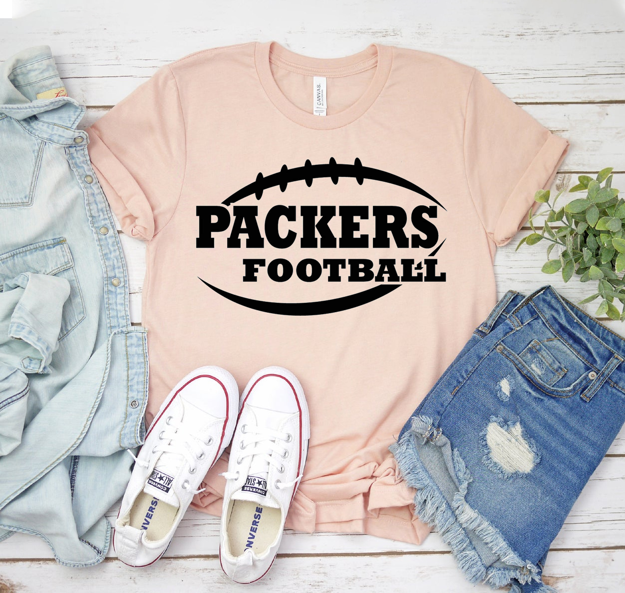 Packers Football T-shirt in vibrant green color, featuring the team logo, made from soft cotton fabric.