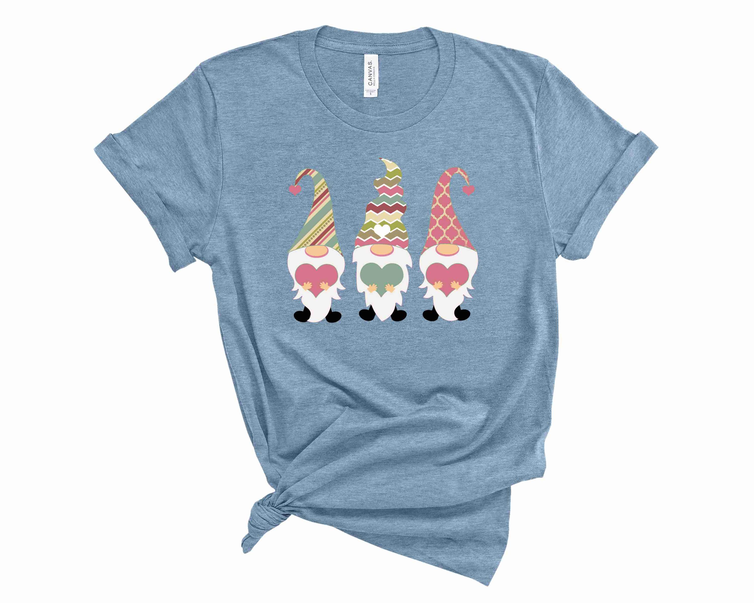 A pastel gnome graphic tee featuring colorful gnome illustrations on a soft fabric, perfect for casual wear.