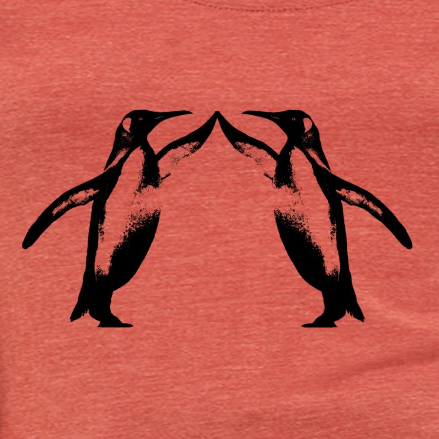 A playful t-shirt featuring a cute penguin graphic giving a high five, perfect for animal lovers.