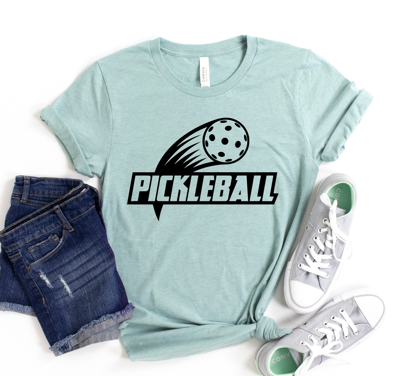 A unisex Pickle Ball T-shirt made from soft, breathable cotton, featuring a classic design suitable for all pickleball enthusiasts.