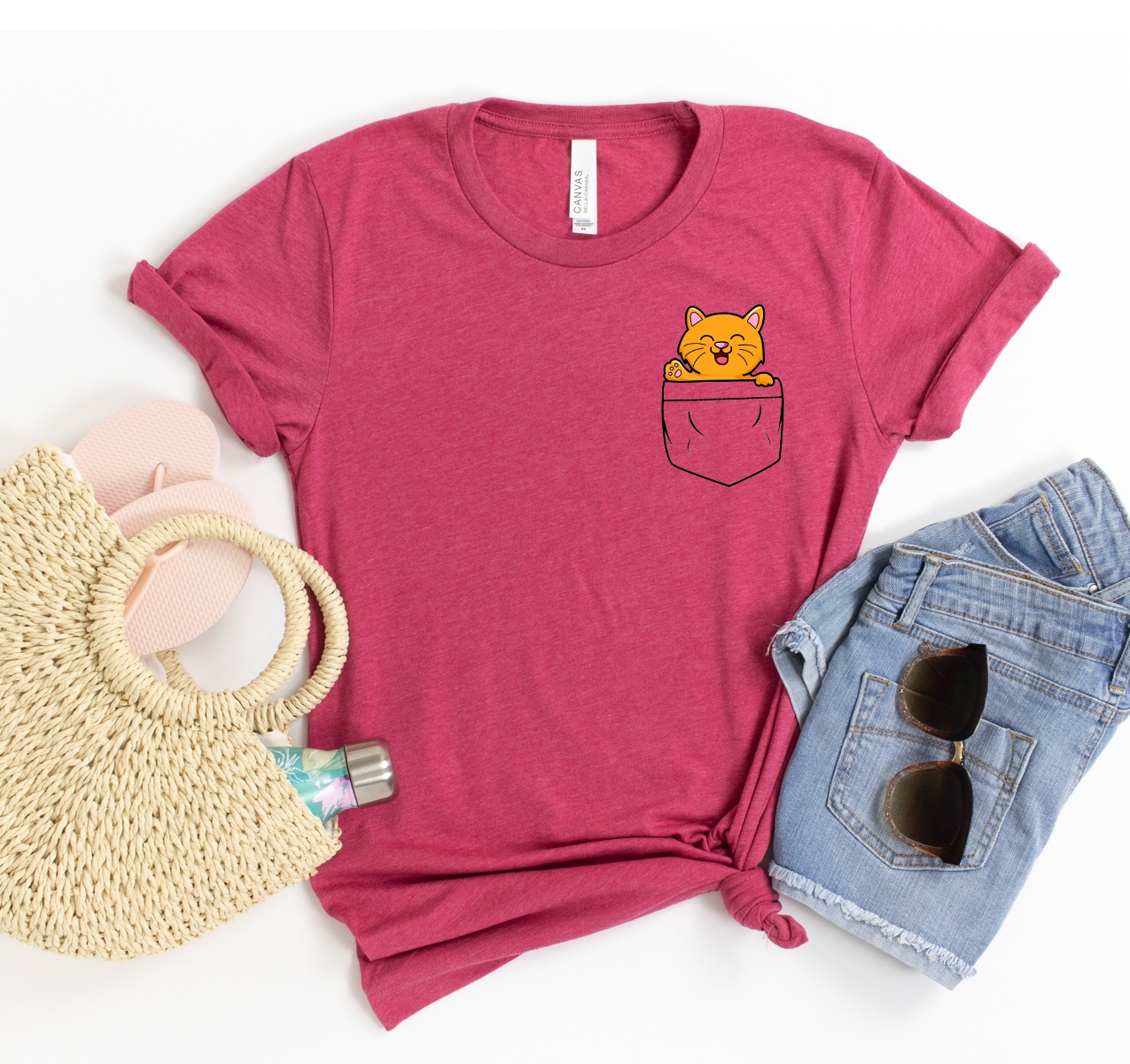 A stylish Pocket Cat T-shirt featuring a playful cat design, made from soft, high-quality cotton, available in various sizes.