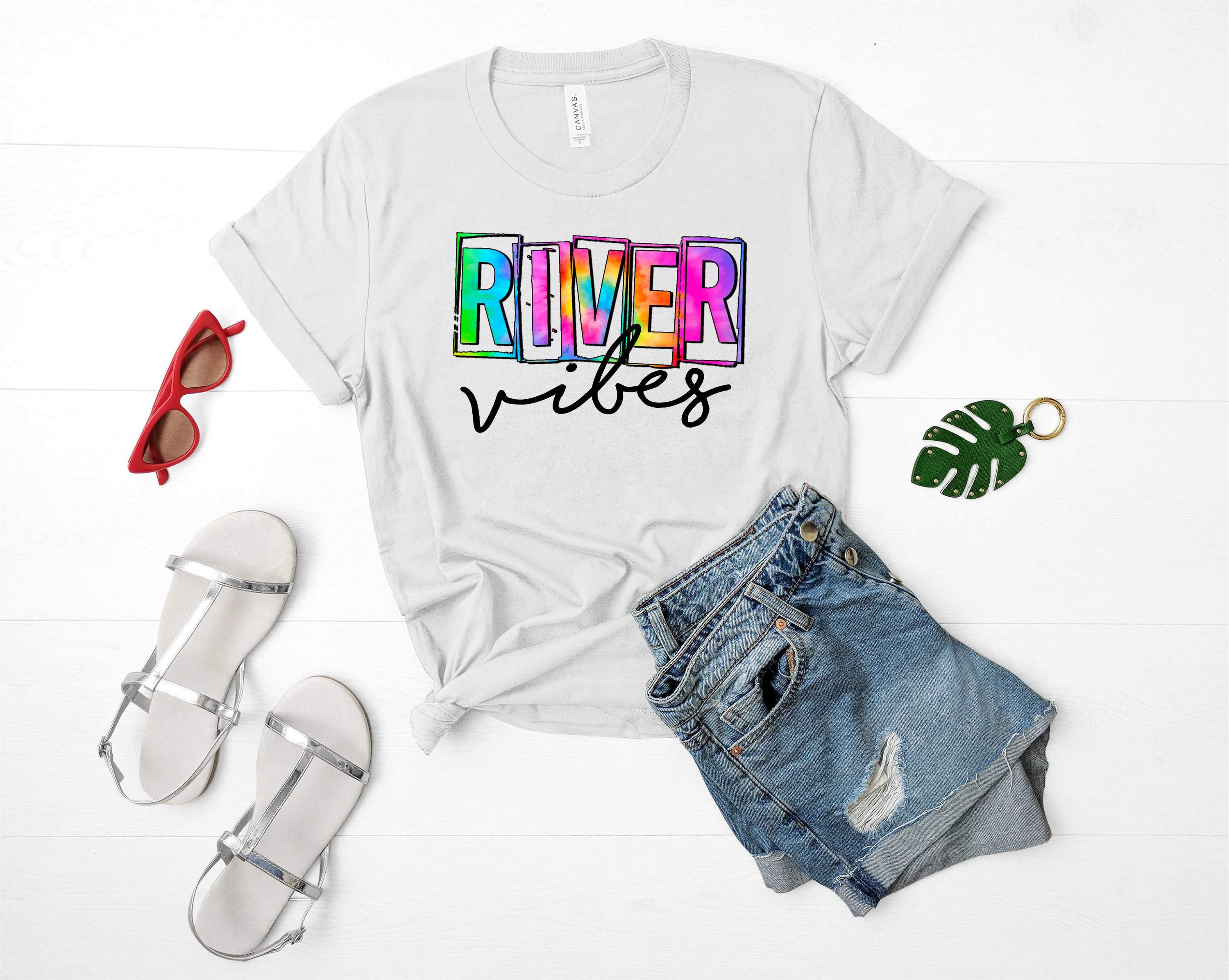A stylish unisex graphic tee featuring a vibrant river-themed design, perfect for casual wear.