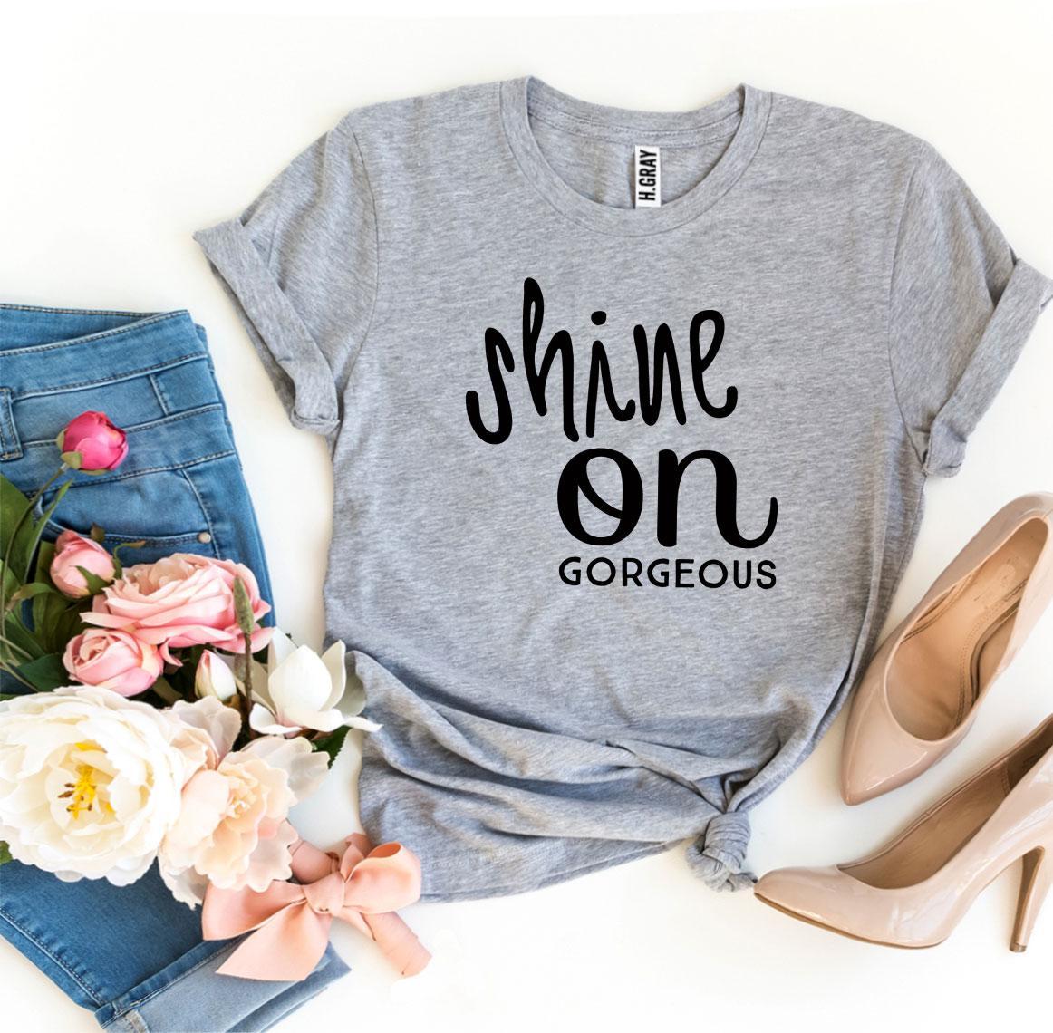 Shine On Gorgeous T-shirt made from premium ring spun cotton, featuring a soft textile flex print design in various sizes.