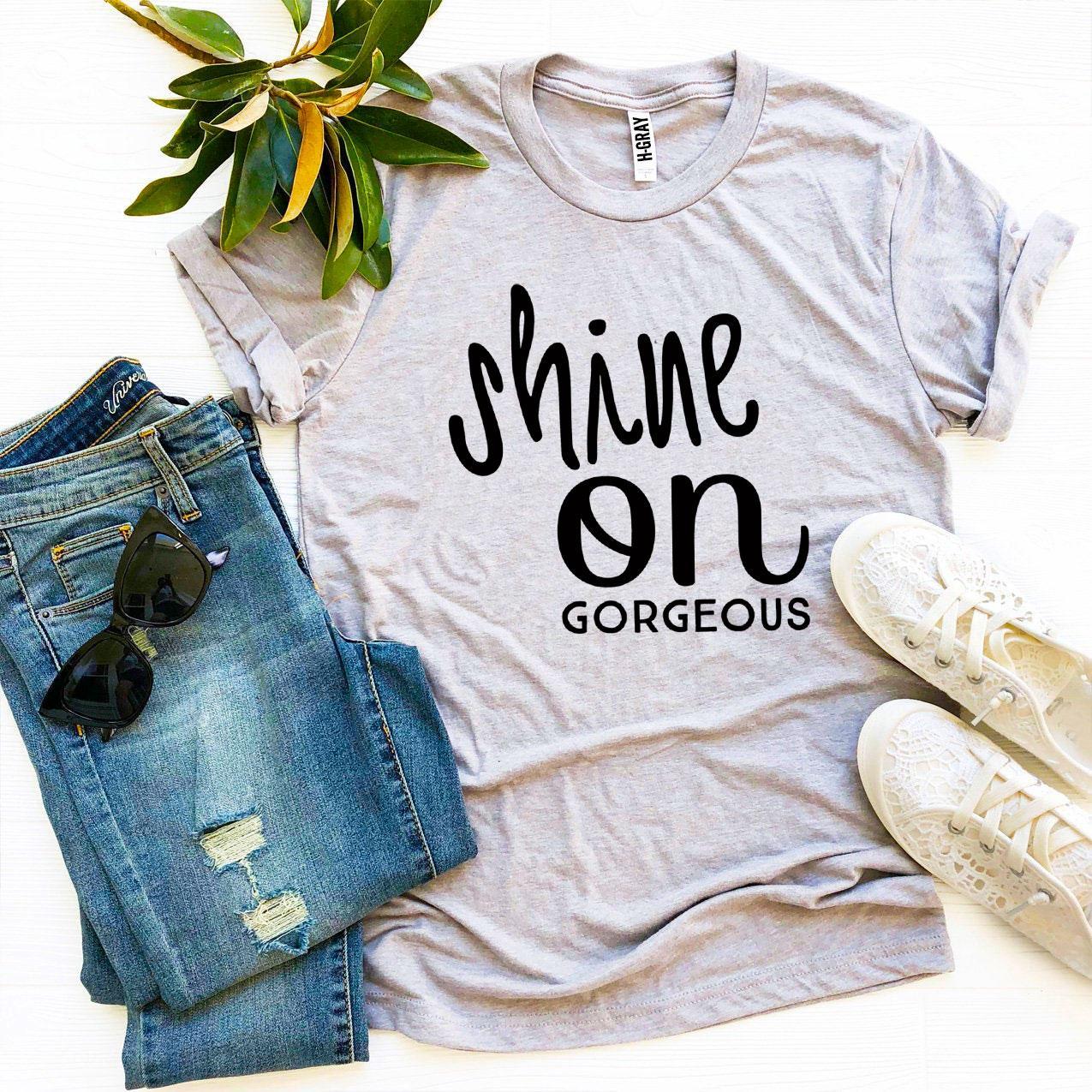 Shine On Gorgeous T-shirt made from premium ring spun cotton, featuring a soft textile flex print design in various sizes.