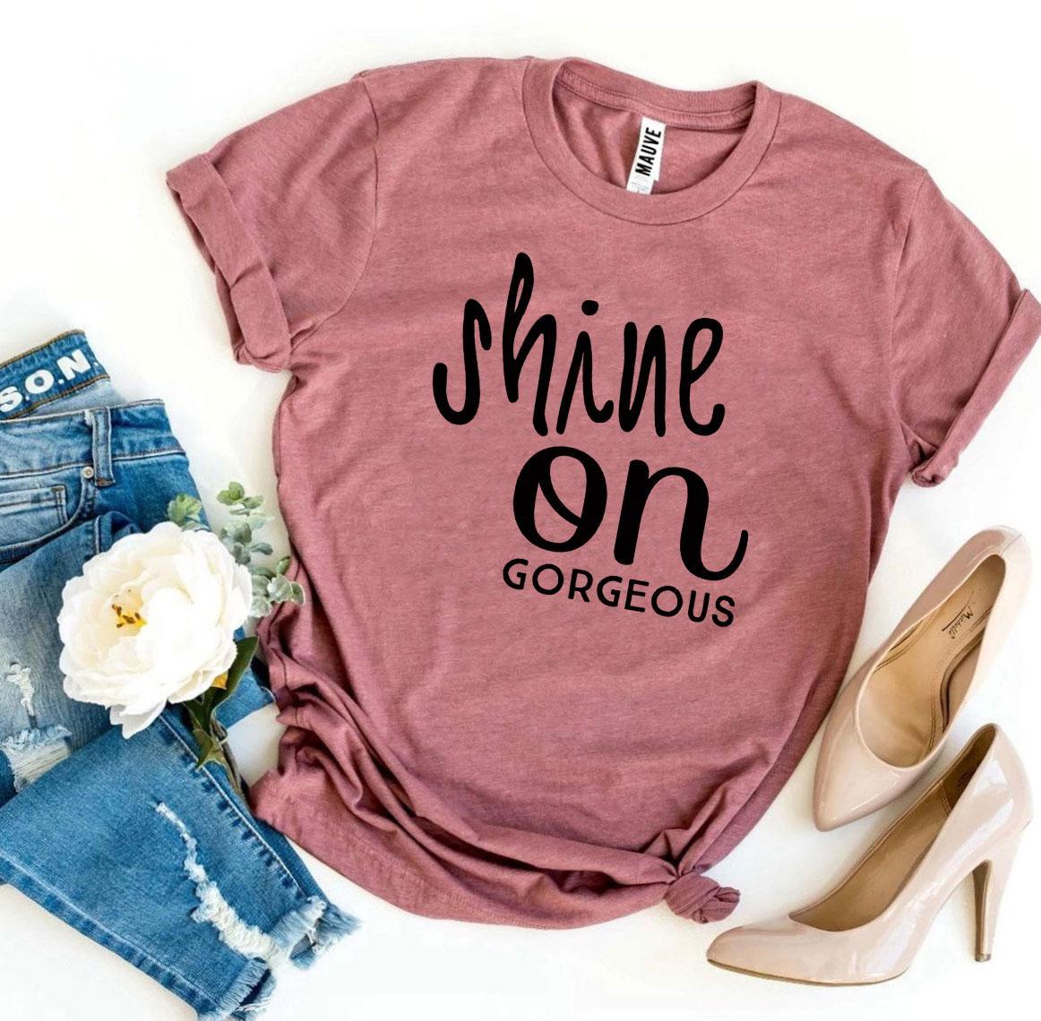 Shine On Gorgeous T-shirt made from premium ring spun cotton, featuring a soft textile flex print design in various sizes.