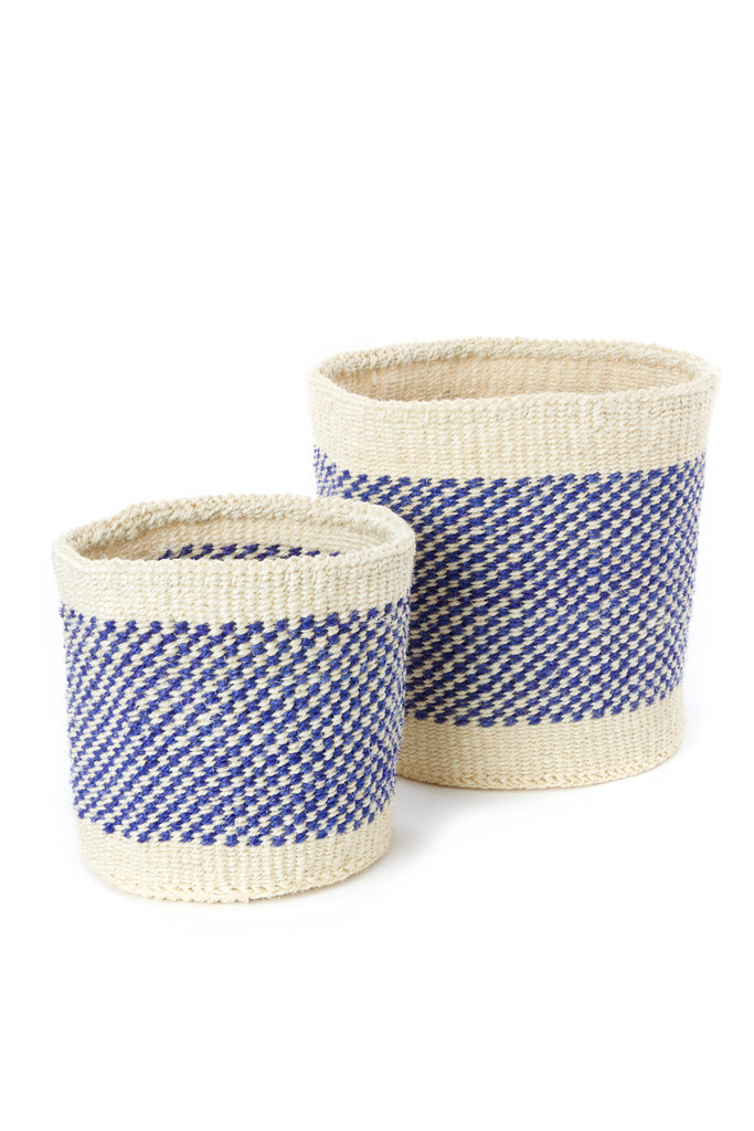 A set of two handwoven sisal fibre baskets, one small and one large, showcasing natural and hand-dyed colors, perfect for storage or planting.