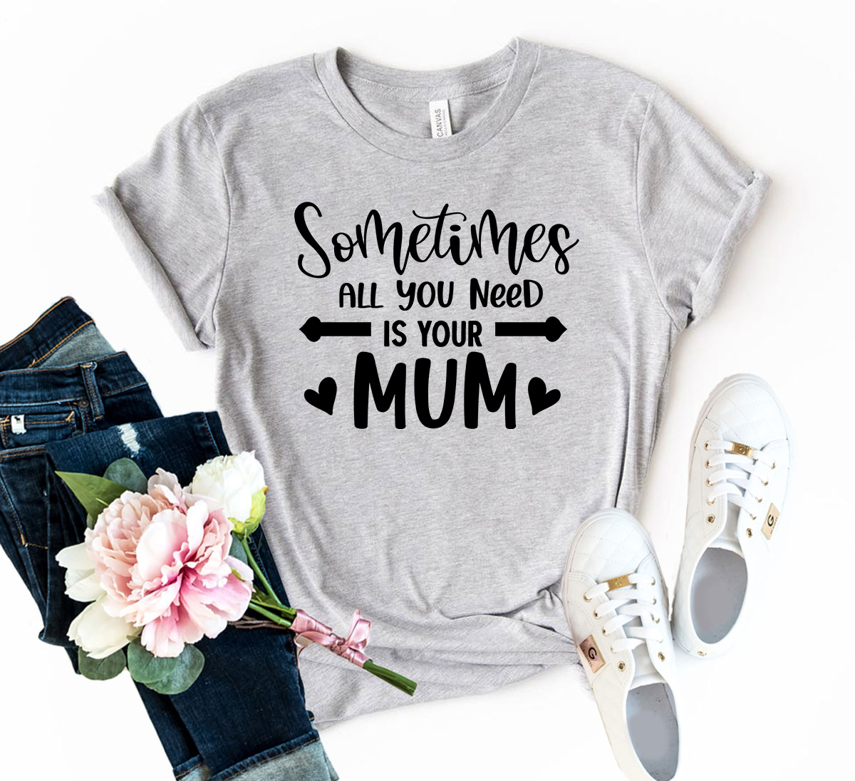 A unisex T-shirt featuring the phrase 'Sometimes All You Need Is Your Mum' printed on it, made from soft ring spun cotton, available in various colors.