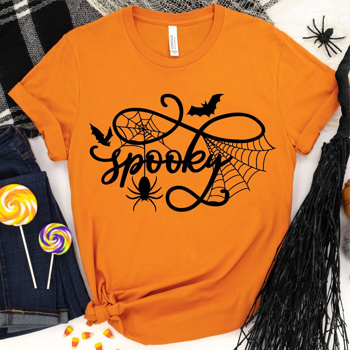 Spooky Halloween T-shirt featuring a vibrant design, made from premium ring spun cotton, available in various sizes.