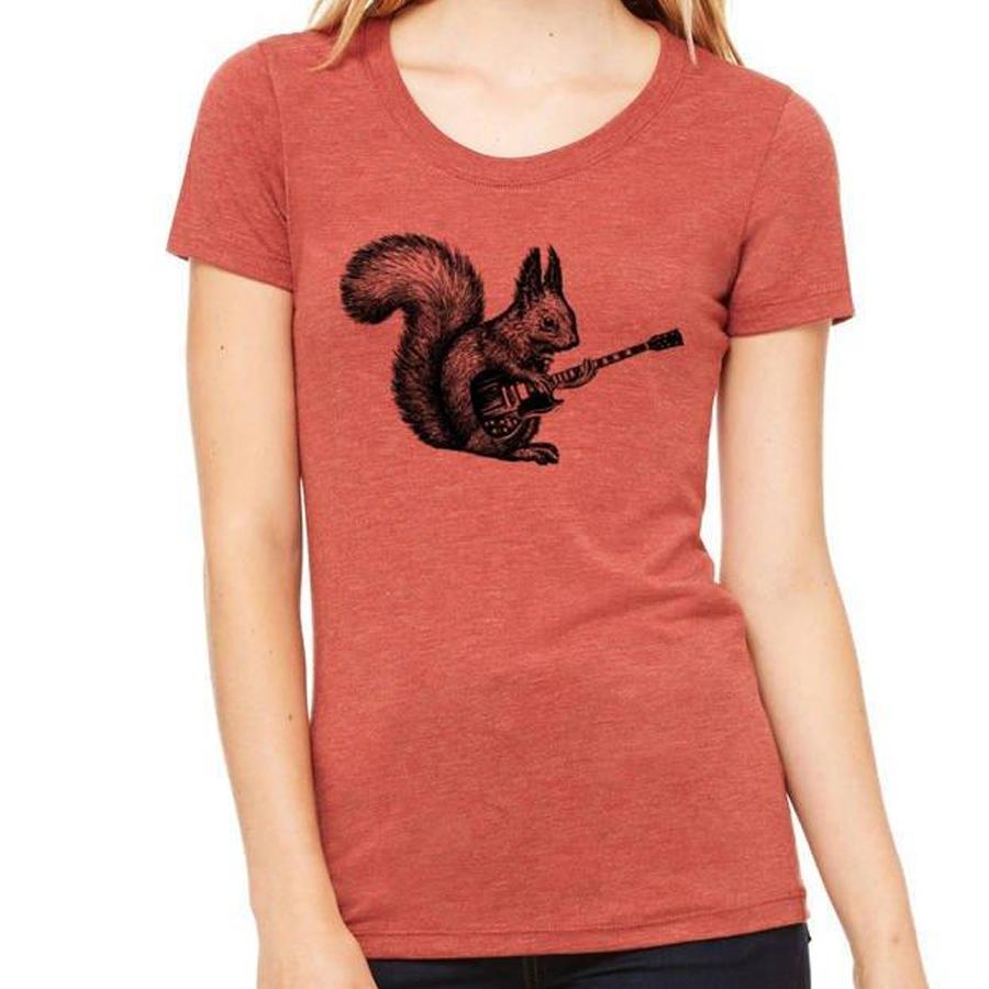A playful squirrel playing a guitar, featured on a women's shirt, showcasing a fun and whimsical design.
