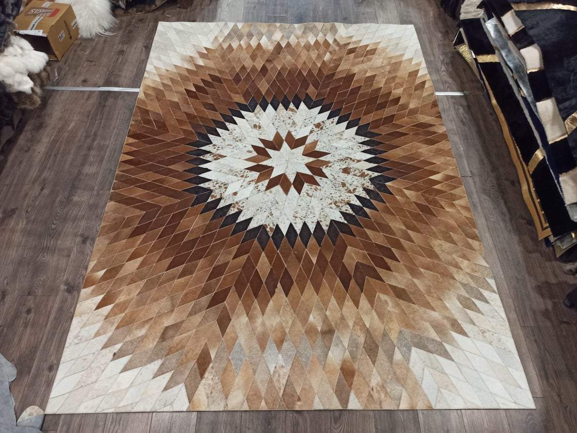 Star Pattern Cow Skin Rug showcasing a unique zigzag design in natural cowhide, perfect for enhancing home decor.