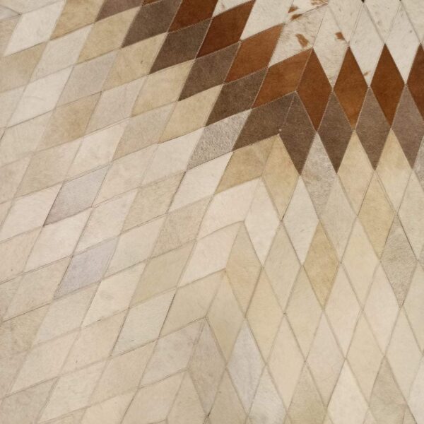 Star Pattern Cow Skin Rug showcasing a unique zigzag design in natural cowhide, perfect for enhancing home decor.