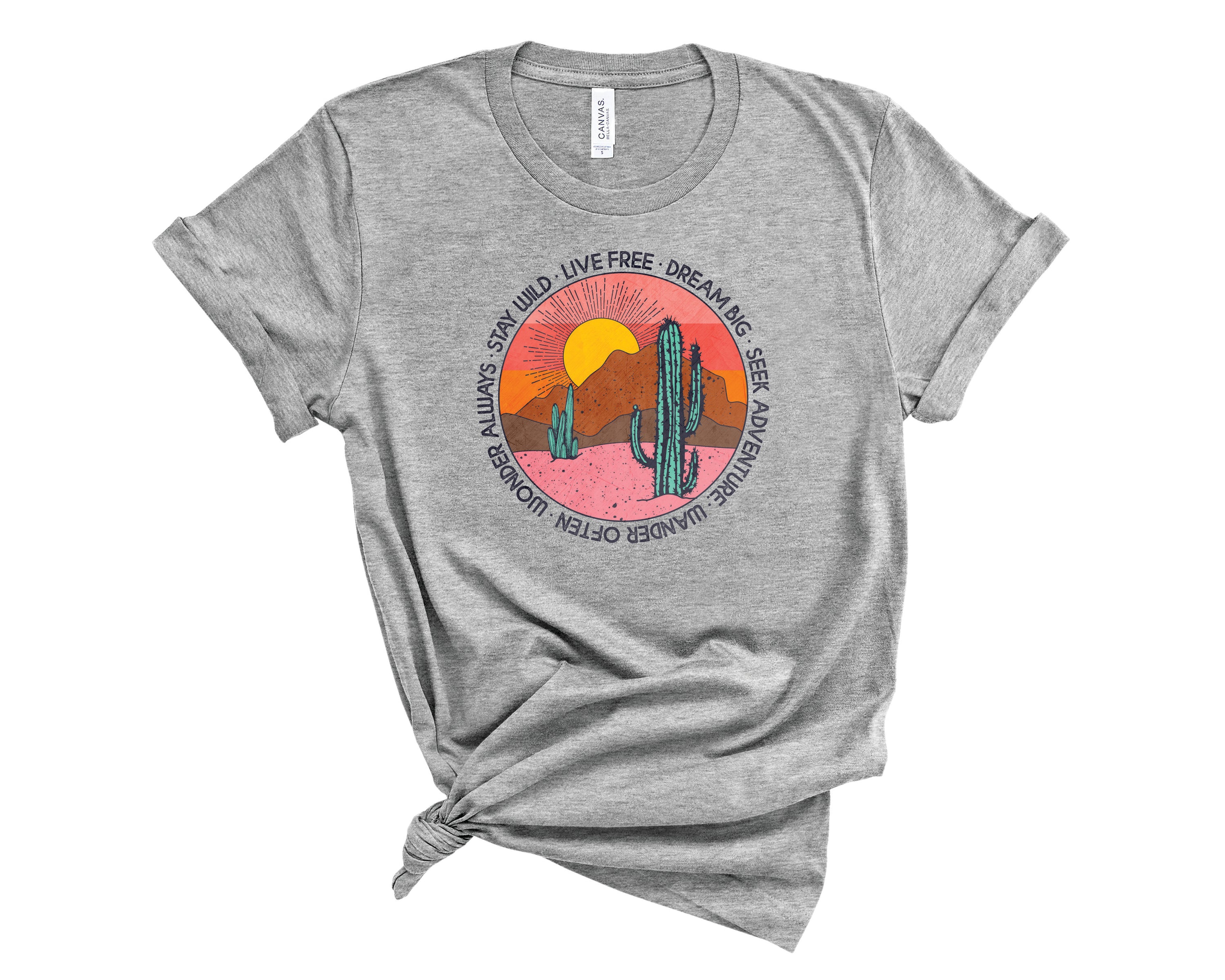 Stay Wild Retro Desert Graphic Tee featuring a vibrant desert graphic on a soft unisex t-shirt.