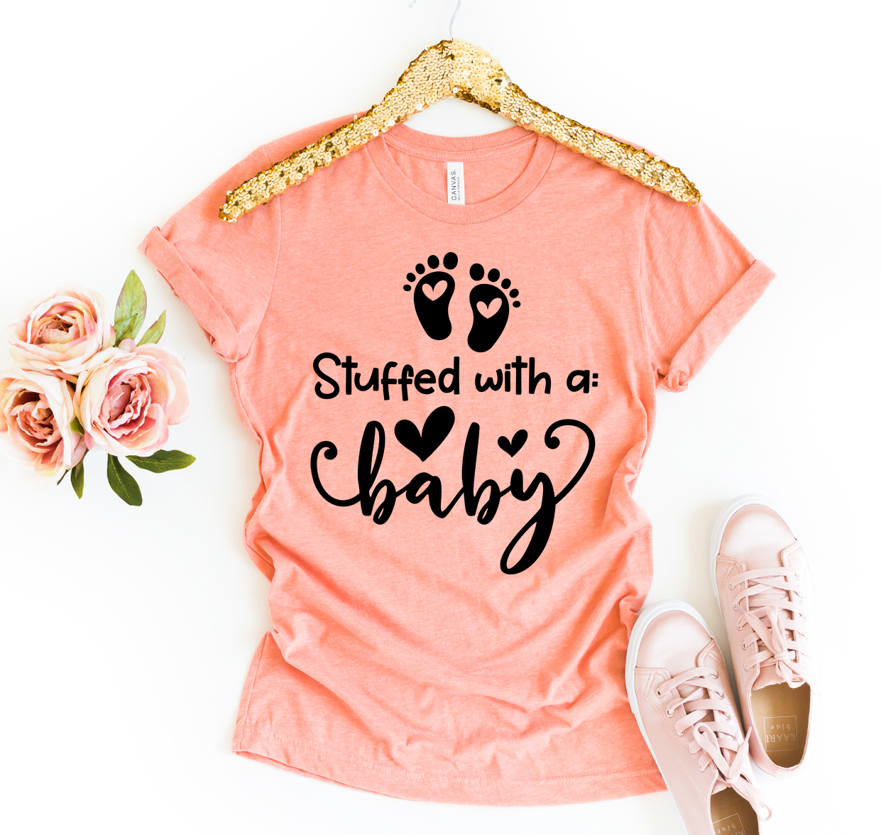 A soft and stylish Stuffed With A Baby T-shirt made from premium ring spun cotton, featuring a high-quality flex print design.