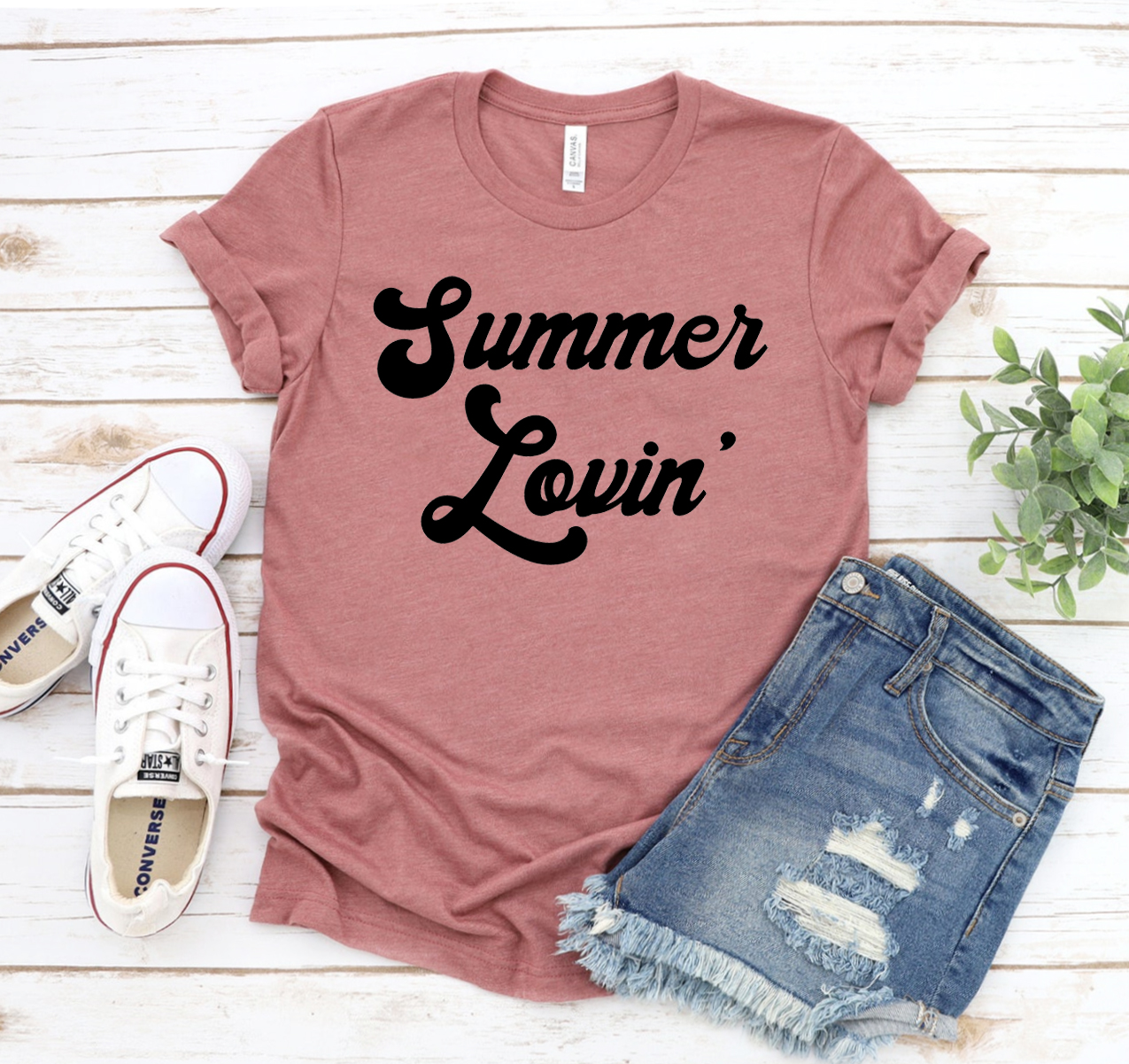 A stylish Summer Lovin T-shirt made from soft airlume cotton, showcasing its unisex design and available sizes.