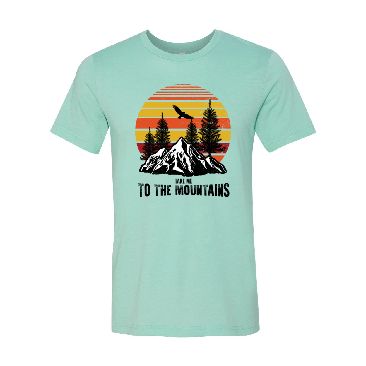 Take Me To The Mountains T-shirt in a scenic outdoor setting, showcasing its unisex design and soft fabric.
